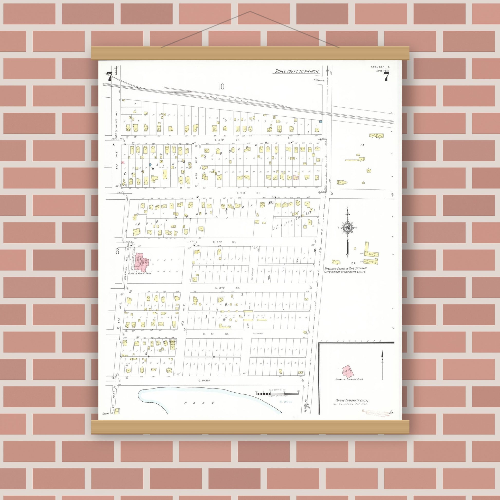 Old map wall art mockup — magnetic wood frame on brick wall — Sanborn Fire Insurance Map from Spencer, Clay County, Iowa (1941), Sheet #0007