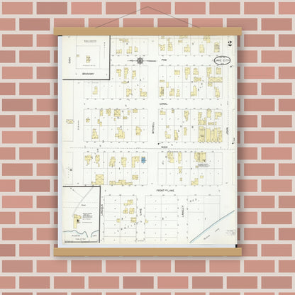 Old map wall art mockup — magnetic wood frame on brick wall — Sanborn Fire Insurance Map from Lake City, Missaukee County, Michigan (1910), Sheet #0002