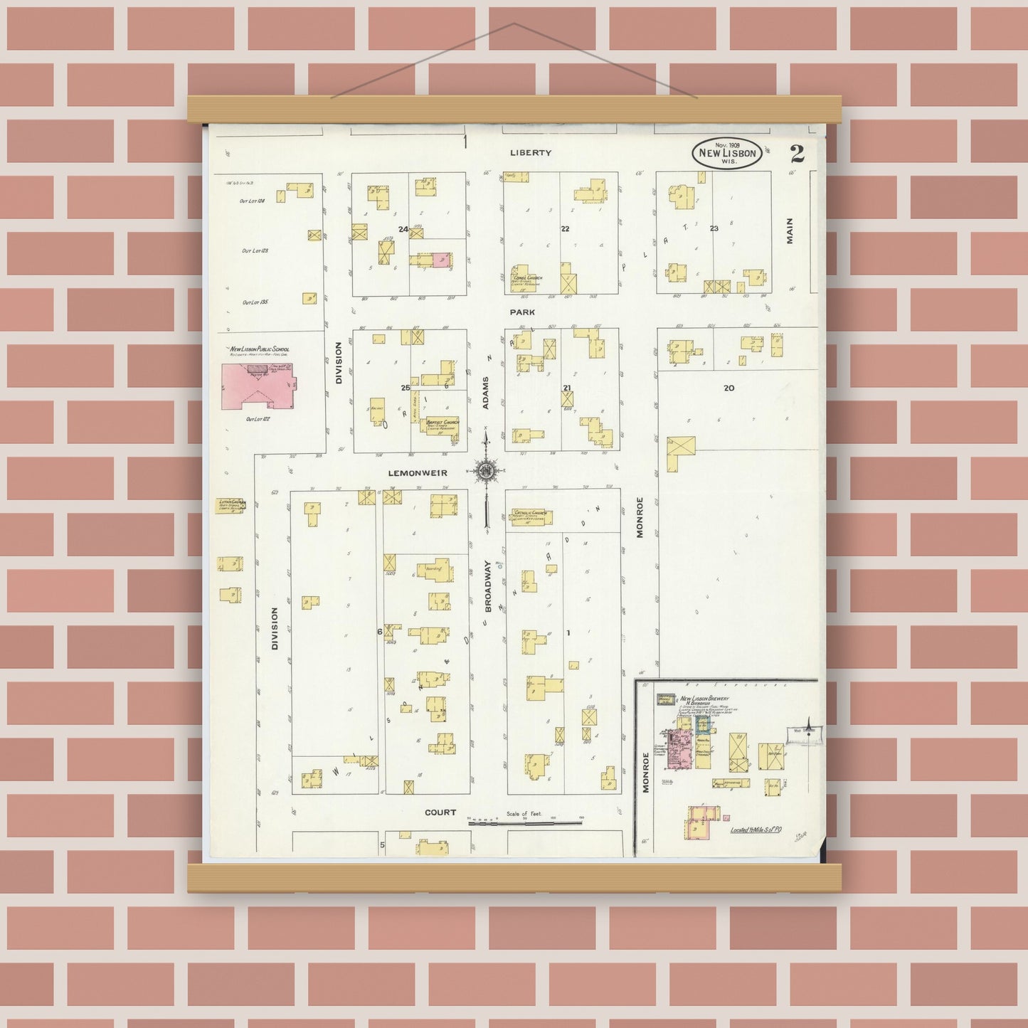 Old map wall art mockup — magnetic wood frame on brick wall — Sanborn Fire Insurance Map from New Lisbon, Juneau County, Wisconsin (1909), Sheet #0002
