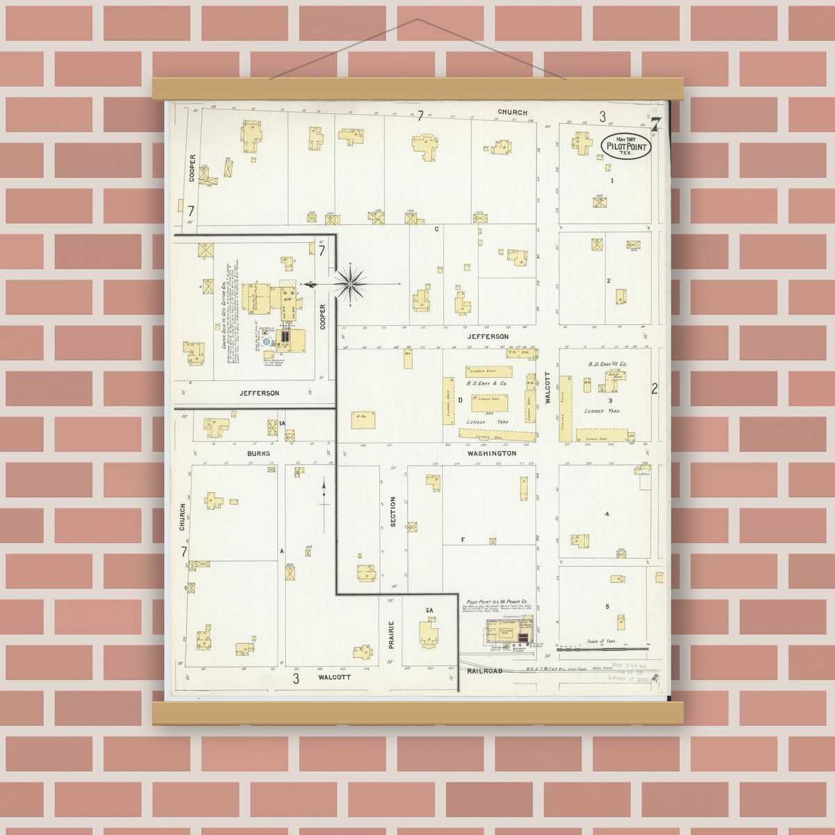 Old map wall art mockup — magnetic wood frame on brick wall — Sanborn Fire Insurance Map from Pilot Point, Denton County, Texas (1907), Sheet #0007
