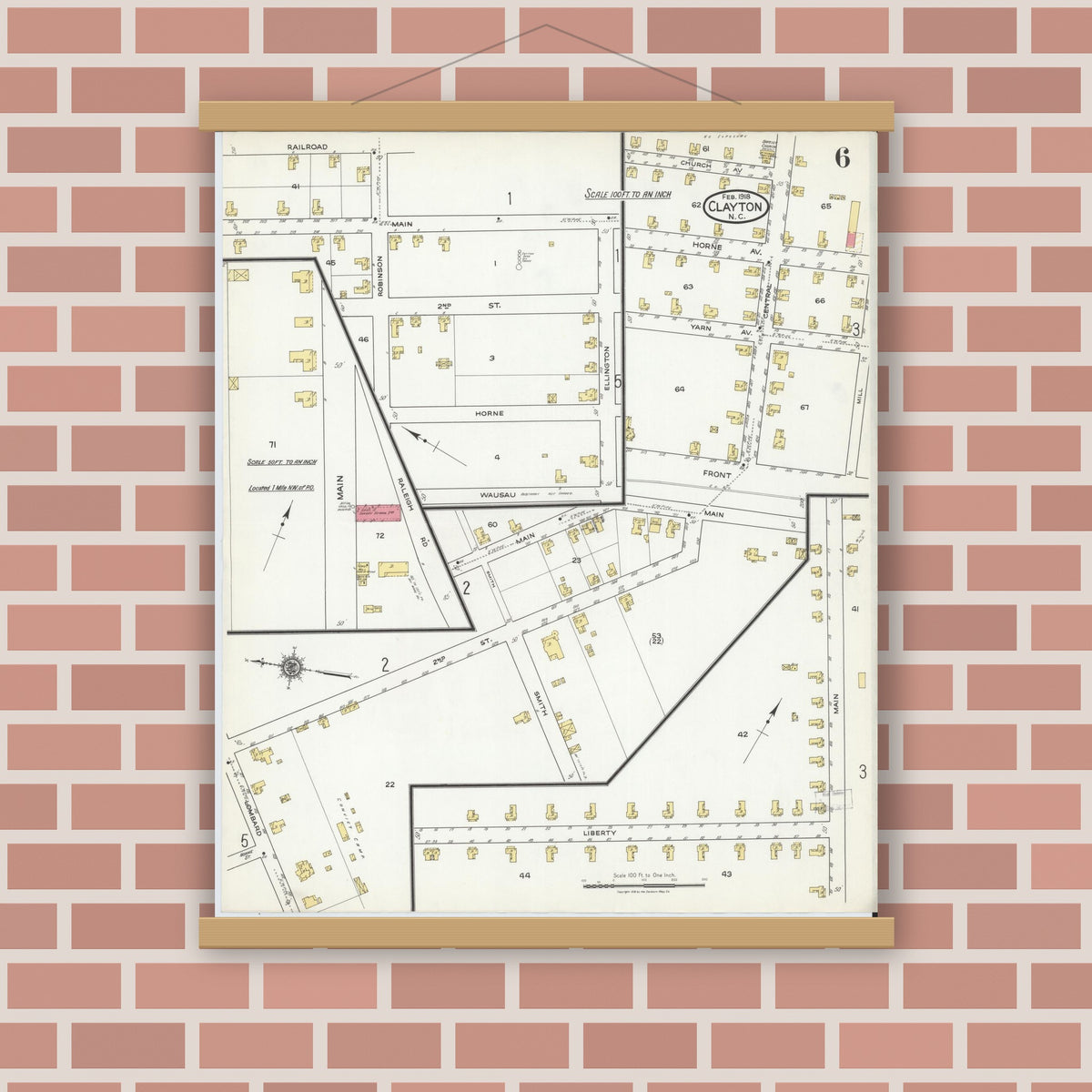 Old map wall art mockup — magnetic wood frame on brick wall — Sanborn Fire Insurance Map from Clayton, Johnston County, North Carolina (1918), Sheet #0006