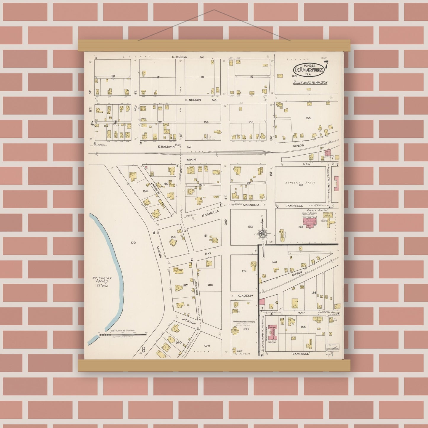 Old map wall art mockup — magnetic wood frame on brick wall — Sanborn Fire Insurance Map from De Funiak Springs, Walton County, Florida (1922), Sheet #0007
