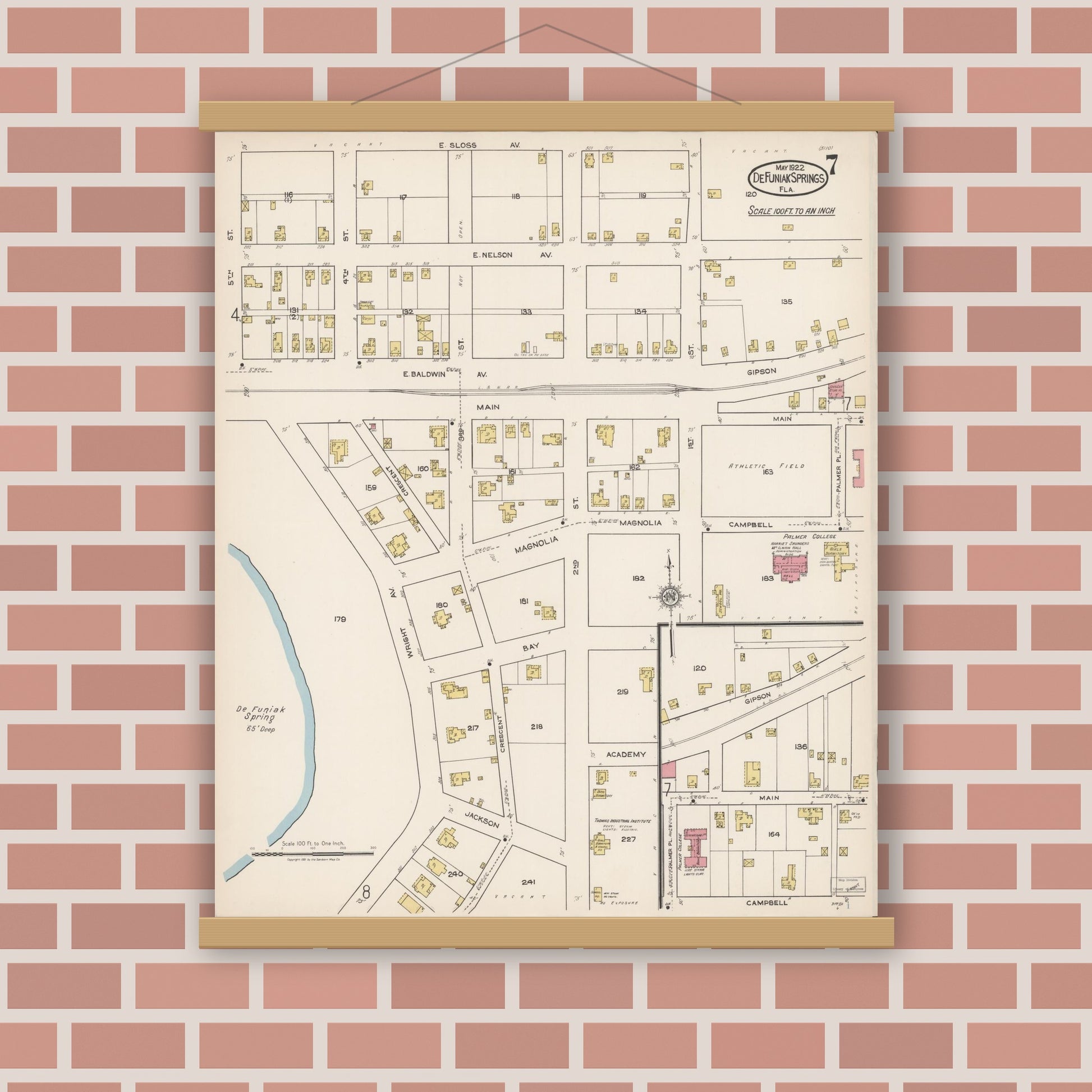 Old map wall art mockup — magnetic wood frame on brick wall — Sanborn Fire Insurance Map from De Funiak Springs, Walton County, Florida (1922), Sheet #0007