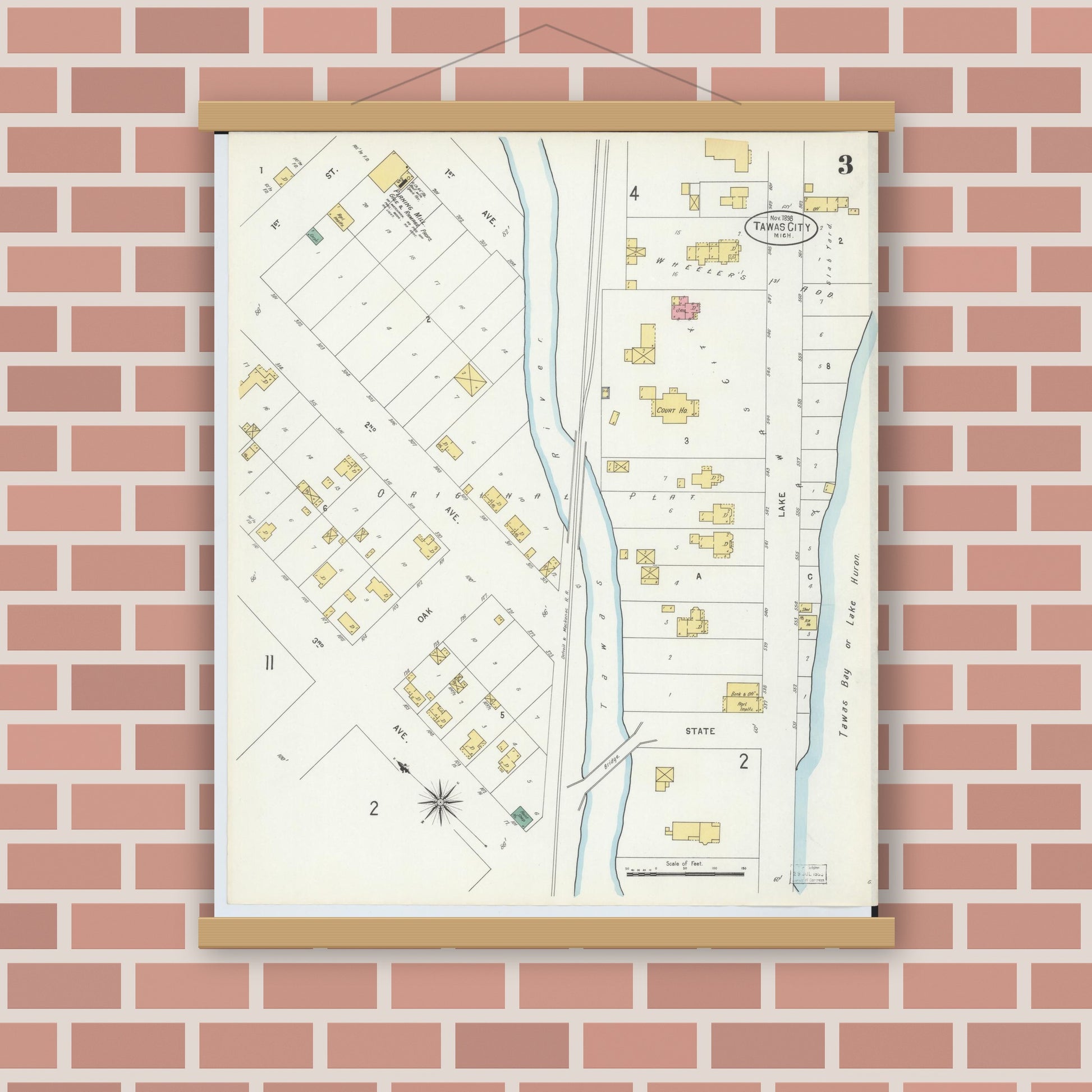 Old map wall art mockup — magnetic wood frame on brick wall — Sanborn Fire Insurance Map from East Tawas, Iosco County, Michigan (1898), Sheet #0003