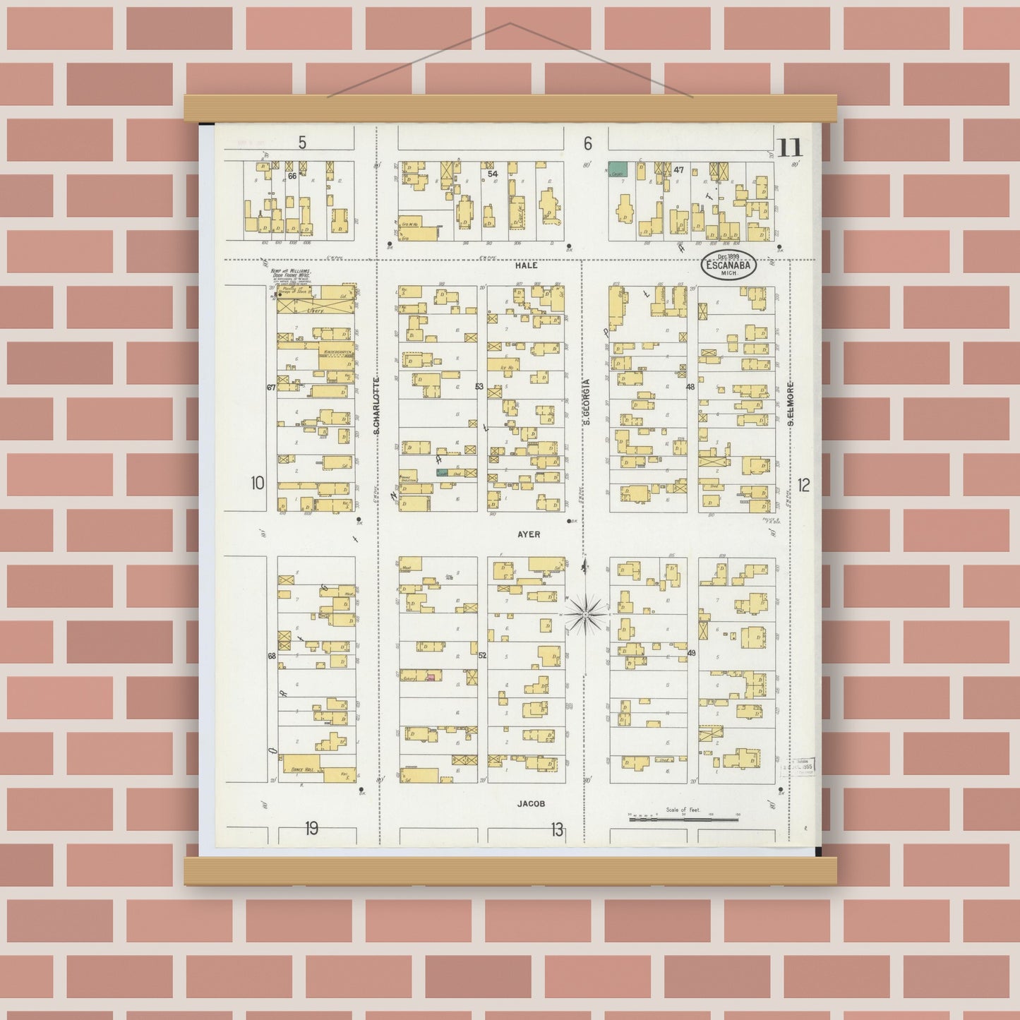 Old map wall art mockup — magnetic wood frame on brick wall — Sanborn Fire Insurance Map from Escanaba, Delta County, Michigan (1899), Sheet #0011