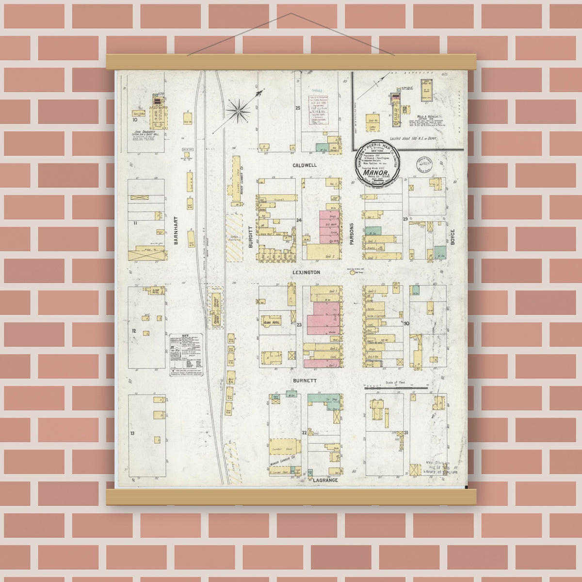 Old map wall art mockup — magnetic wood frame on brick wall — Sanborn Fire Insurance Map from Manor, Travis County, Texas (1900), Sheet #0001