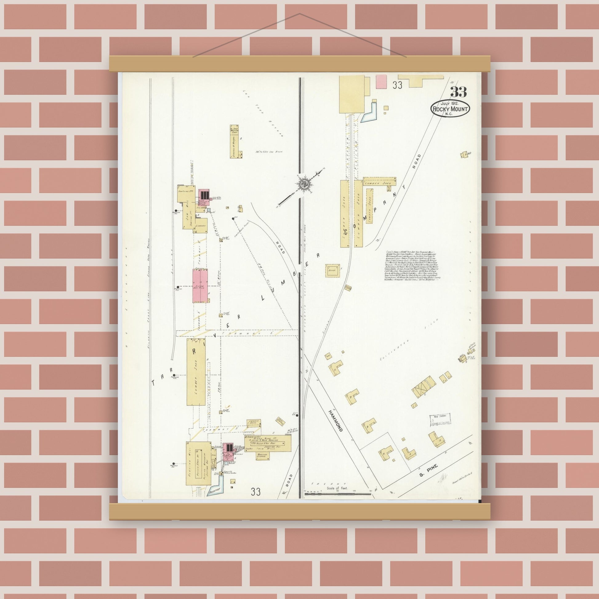 Old map wall art mockup — magnetic wood frame on brick wall — Sanborn Fire Insurance Map from Rocky Mount, Edgecombe And Nash Counties, North Carolina (1912), Sheet #0033