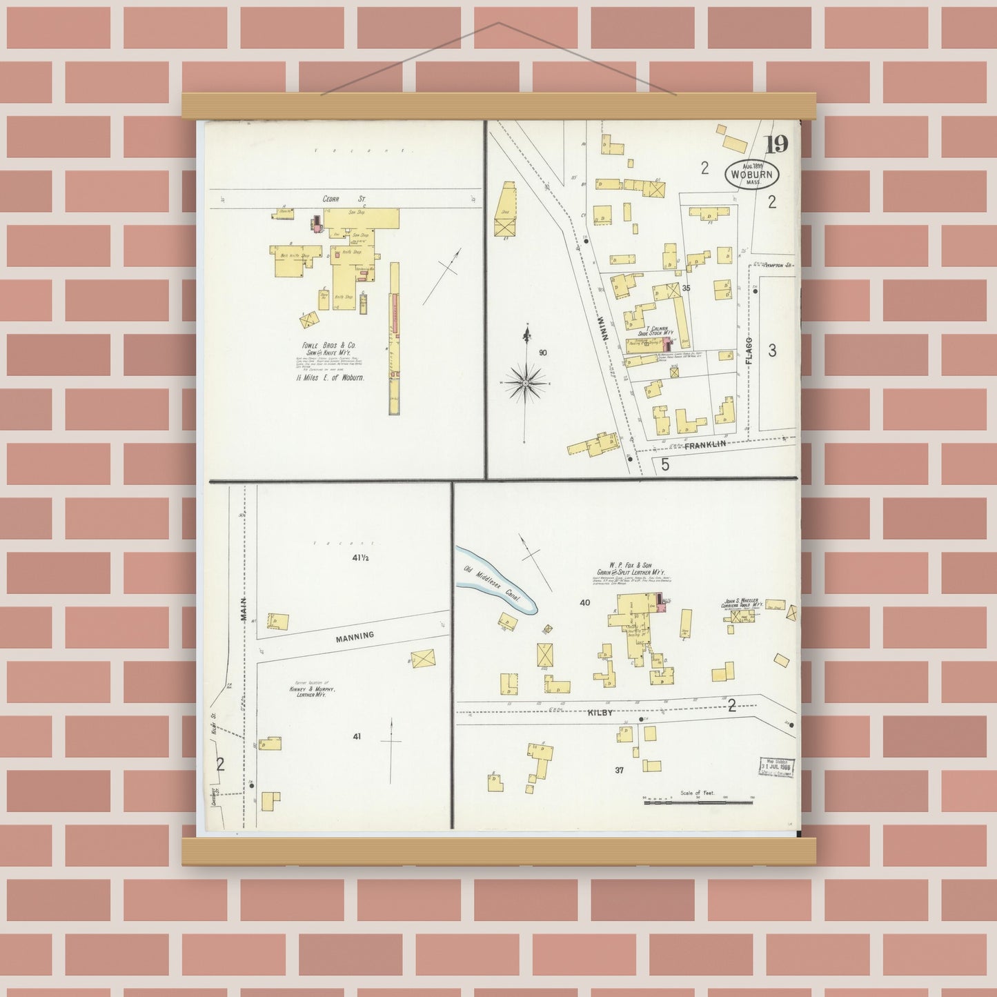 Old map wall art mockup — magnetic wood frame on brick wall — Sanborn Fire Insurance Map from Woburn, Middlesex County, Massachusetts (1899), Sheet #0019