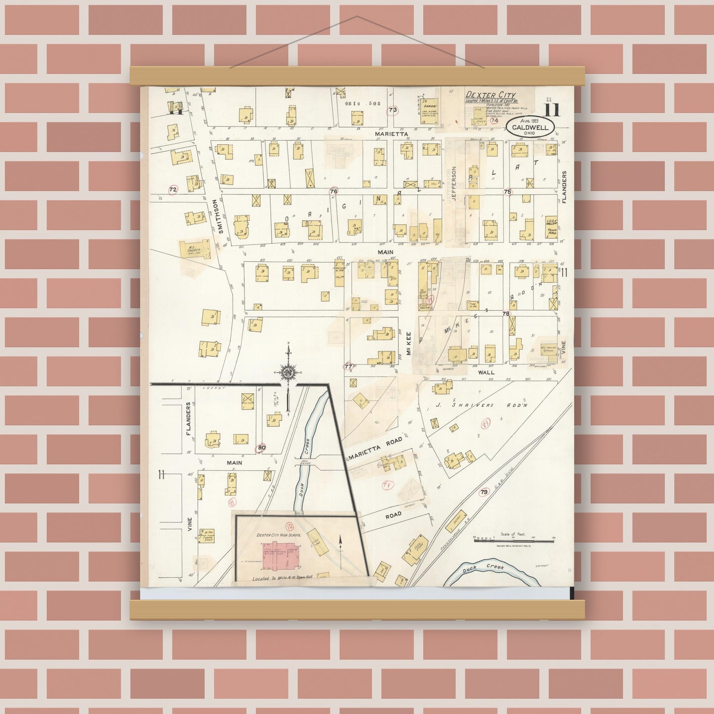 Old map wall art mockup — magnetic wood frame on brick wall — Sanborn Fire Insurance Map from Caldwell, Noble County, Ohio (1932), Sheet #0011