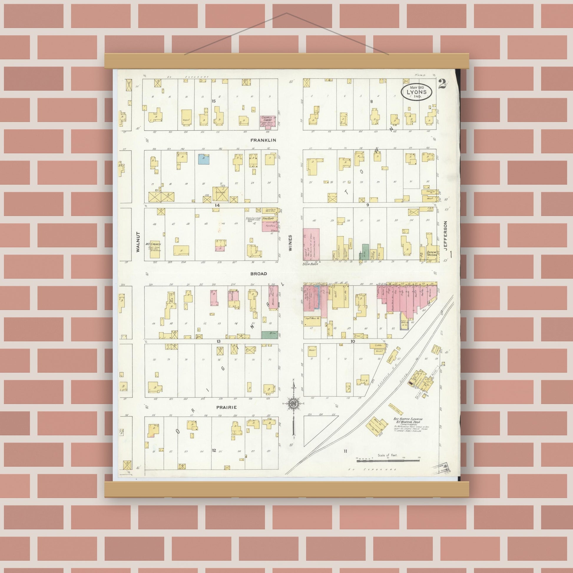 Old map wall art mockup — magnetic wood frame on brick wall — Sanborn Fire Insurance Map from Lyons, Greene County, Indiana (1910), Sheet #0002