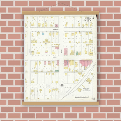 Old map wall art mockup — magnetic wood frame on brick wall — Sanborn Fire Insurance Map from Lyons, Greene County, Indiana (1910), Sheet #0002
