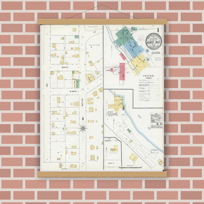 Old map wall art mockup — magnetic wood frame on brick wall — Sanborn Fire Insurance Map from Oconto Falls, Oconto County, Wisconsin (1904), Sheet #0001