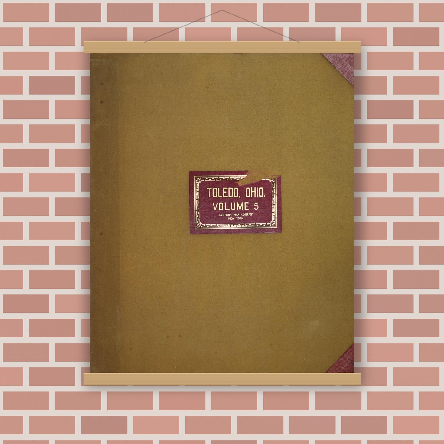 Old map wall art mockup — magnetic wood frame on brick wall — Sanborn Fire Insurance Map from Toledo, Lucas County, Ohio (1950), Sheet #0001