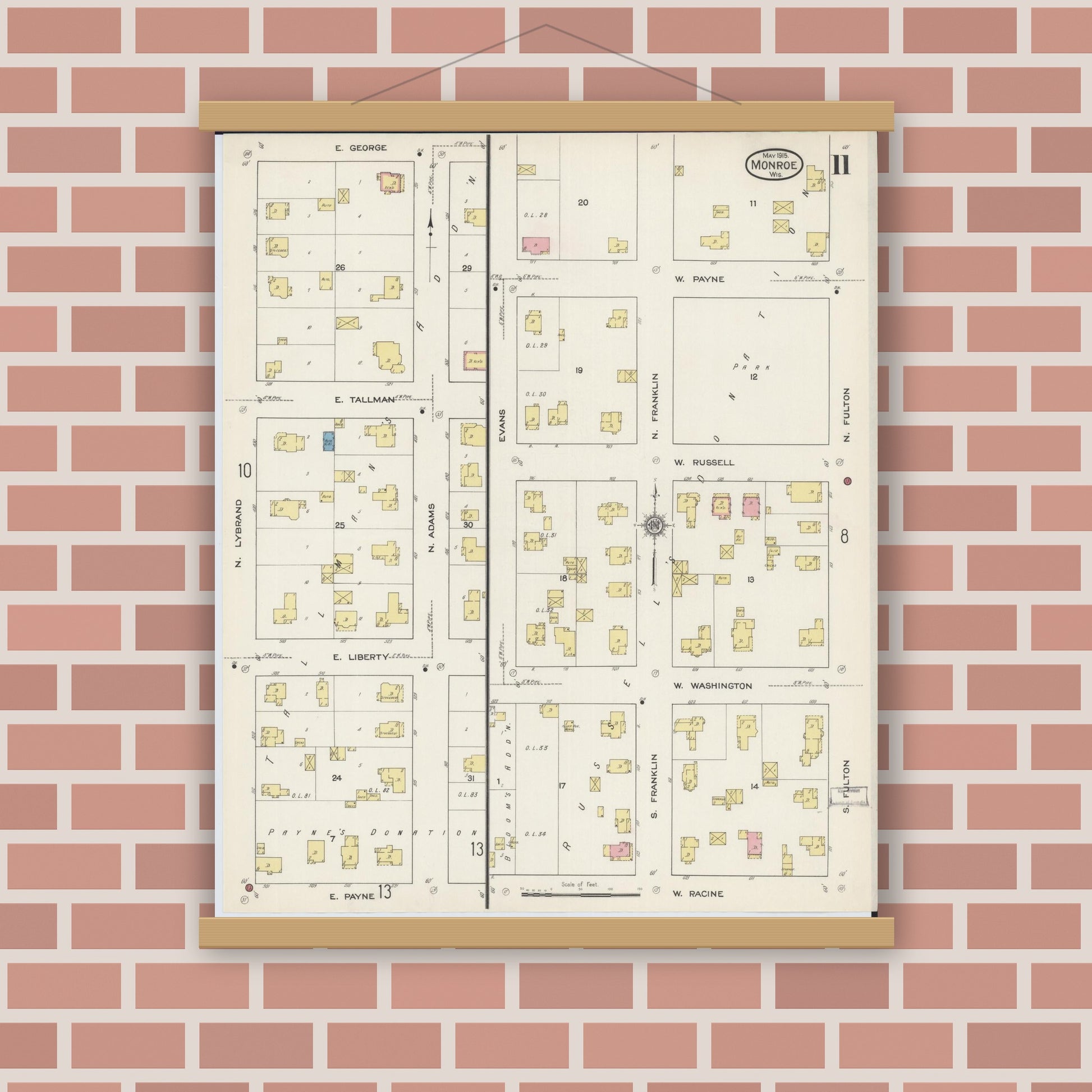 Old map wall art mockup — magnetic wood frame on brick wall — Sanborn Fire Insurance Map from Monroe, Green County, Wisconsin (1915), Sheet #0011
