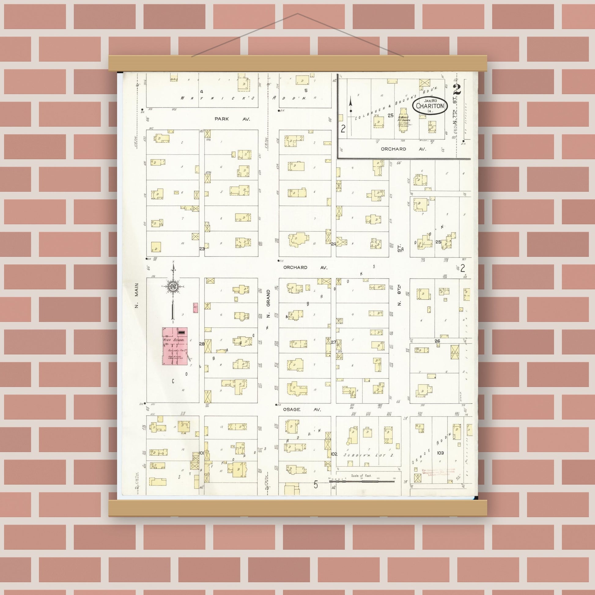 Old map wall art mockup — magnetic wood frame on brick wall — Sanborn Fire Insurance Map from Chariton, Lucas County, Iowa (1913), Sheet #0002