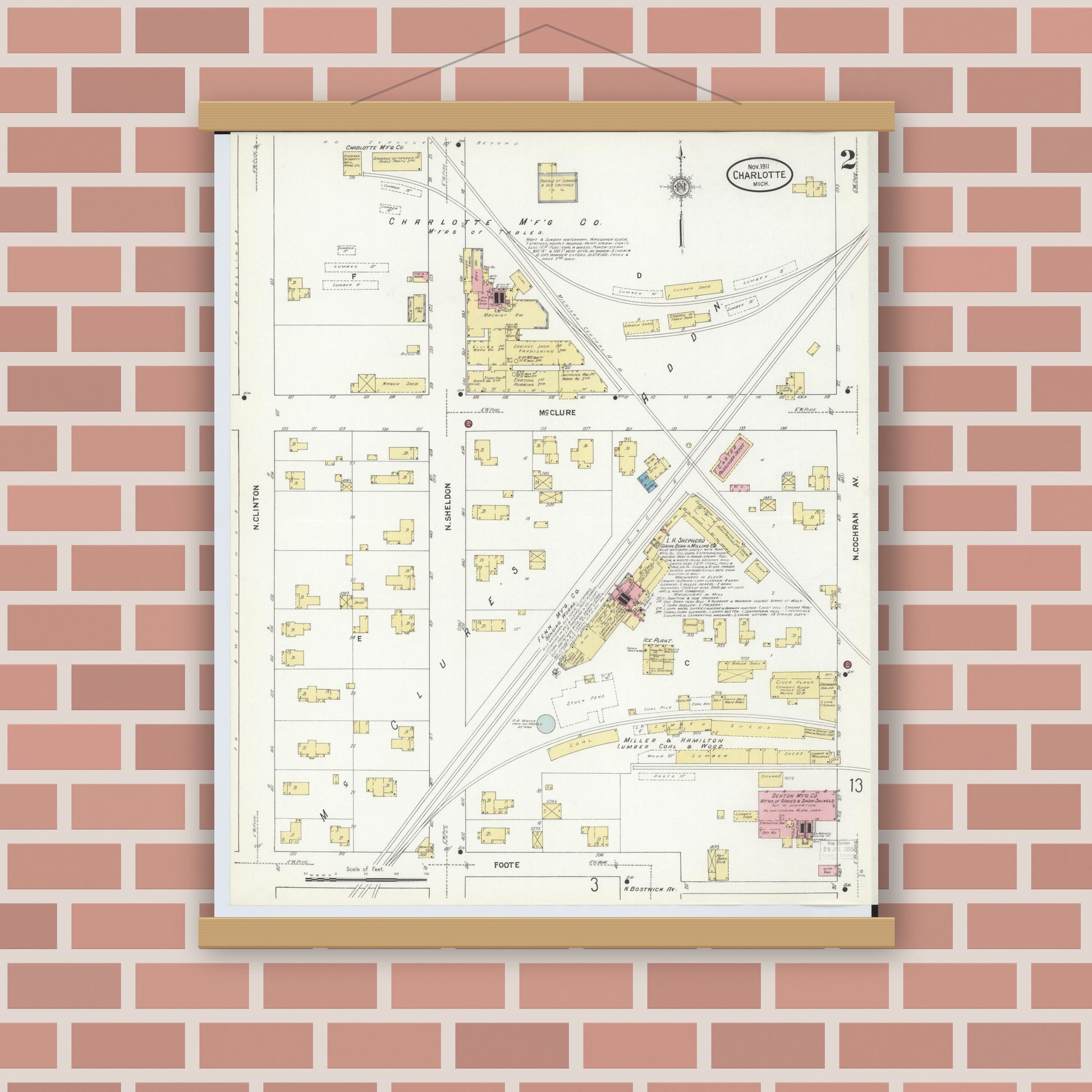 Old map wall art mockup — magnetic wood frame on brick wall — Sanborn Fire Insurance Map from Charlotte, Eaton County, Michigan (1911), Sheet #0002