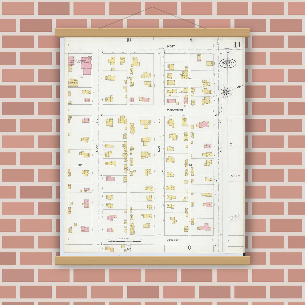 Old map wall art mockup — magnetic wood frame on brick wall — Sanborn Fire Insurance Map from Monroe, Monroe County, Michigan (1899), Sheet #0011