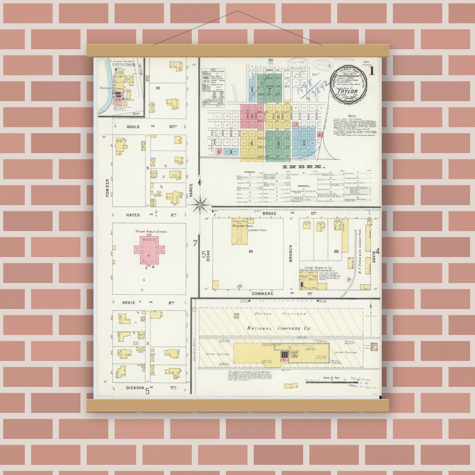 Old map wall art mockup — magnetic wood frame on brick wall — Sanborn Fire Insurance Map from Taylor, Williamson County, Texas (1898), Sheet #0001