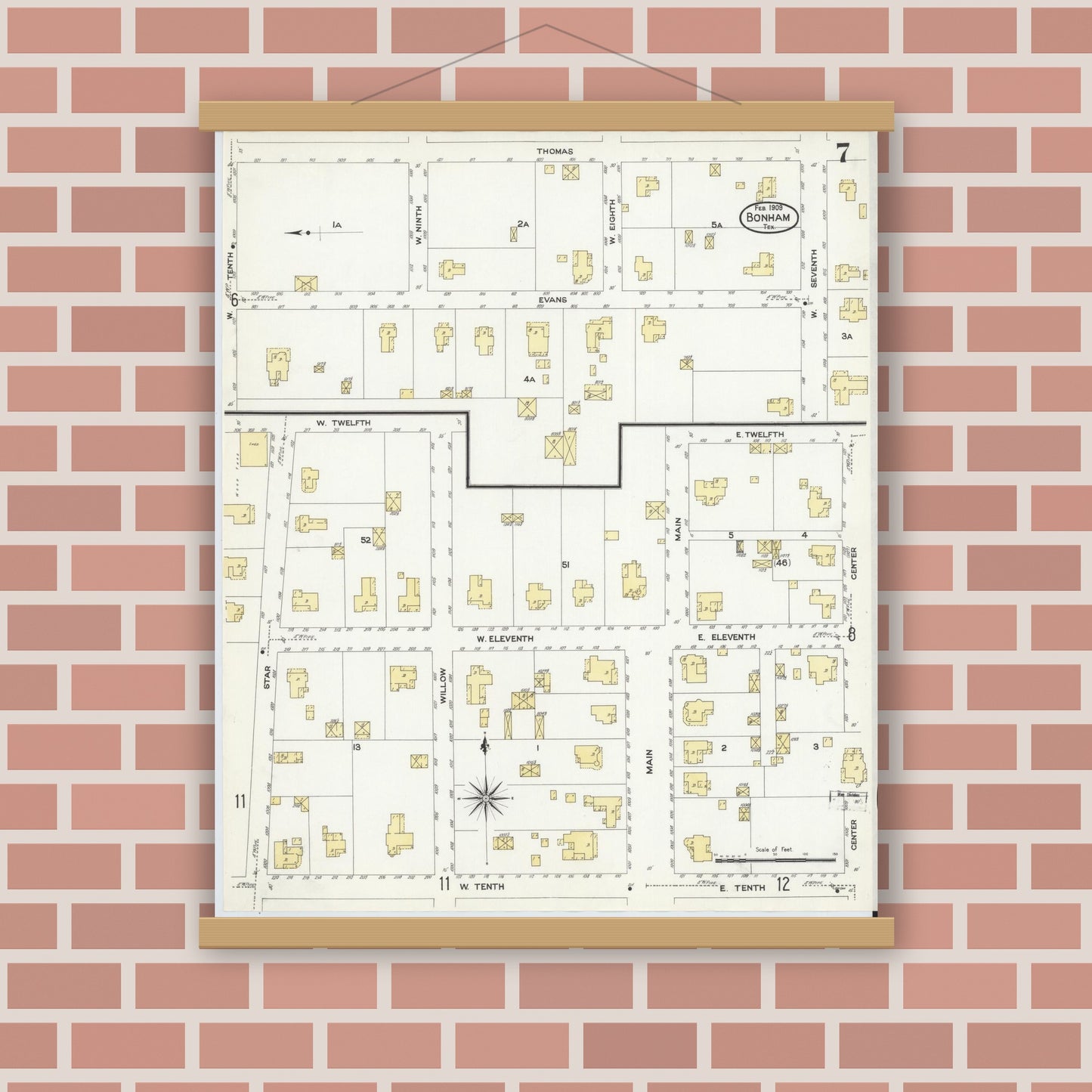 Old map wall art mockup — magnetic wood frame on brick wall — Sanborn Fire Insurance Map from Bonham, Fannin County, Texas (1909), Sheet #0007