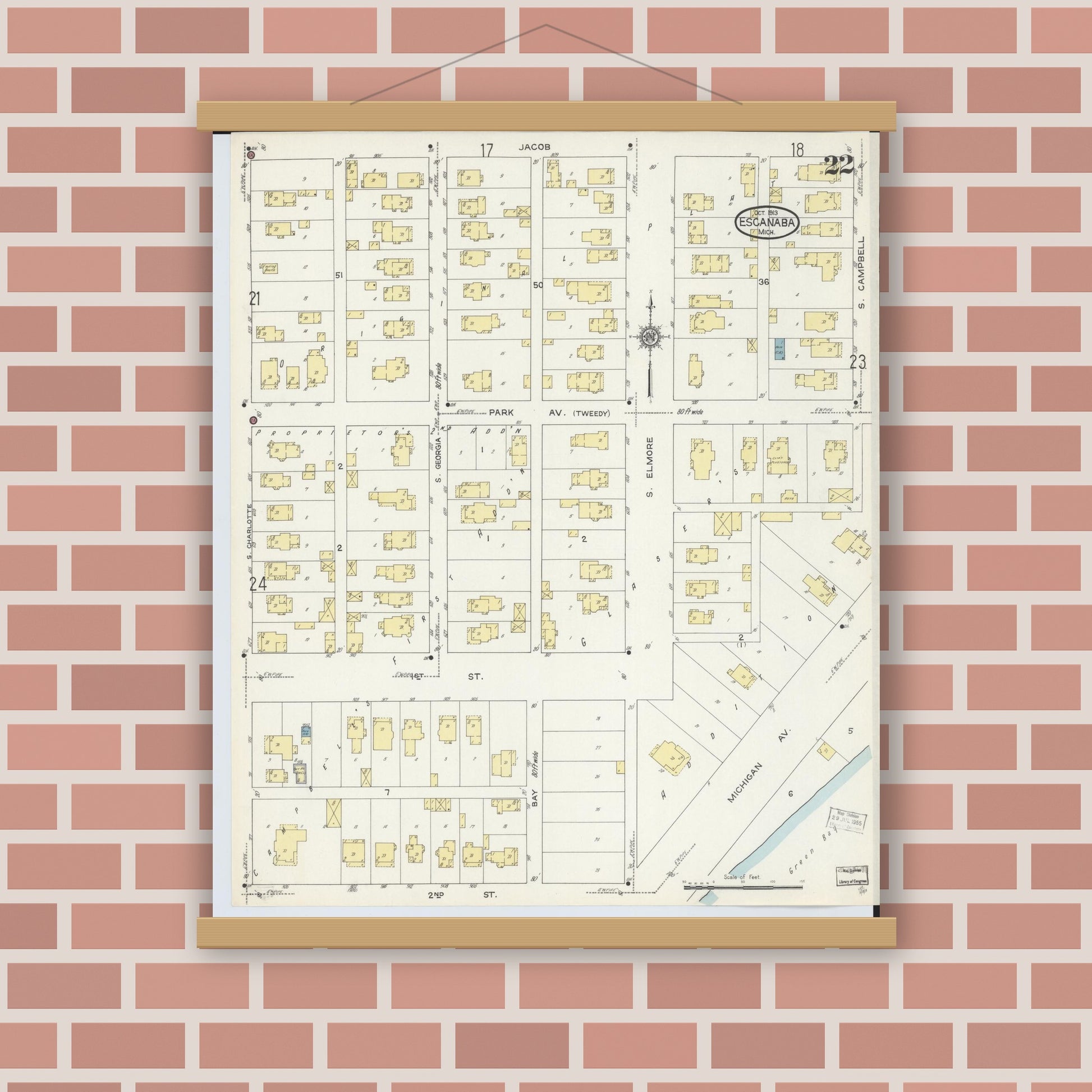 Old map wall art mockup — magnetic wood frame on brick wall — Sanborn Fire Insurance Map from Escanaba, Delta County, Michigan (1913), Sheet #0022