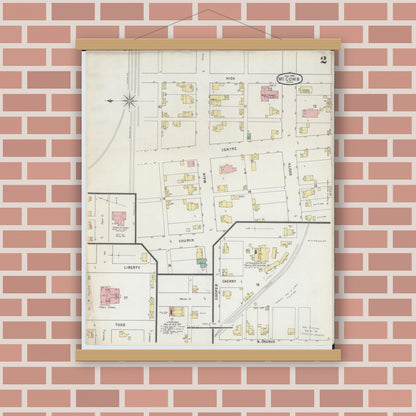 Old map wall art mockup — magnetic wood frame on brick wall — Sanborn Fire Insurance Map from McComb, Hancock County, Ohio (1885), Sheet #0002
