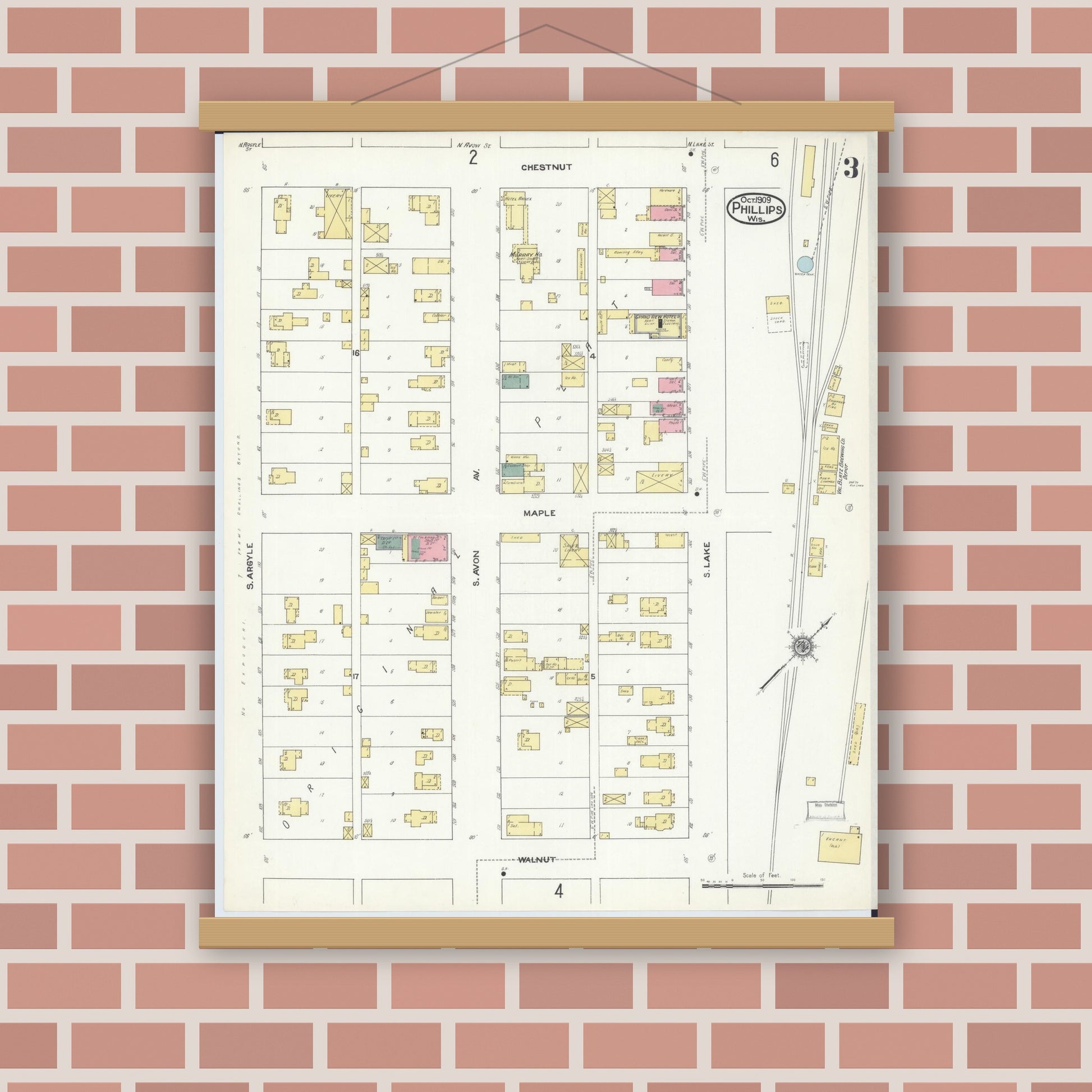 Old map wall art mockup — magnetic wood frame on brick wall — Sanborn Fire Insurance Map from Phillips, Price County, Wisconsin (1909), Sheet #0003
