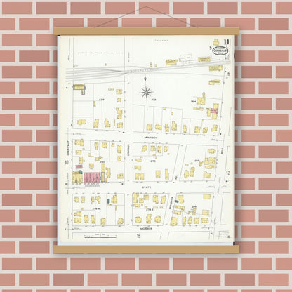 Old map wall art mockup — magnetic wood frame on brick wall — Sanborn Fire Insurance Map from Conneaut, Ashtabula County, Ohio (1909), Sheet #0011