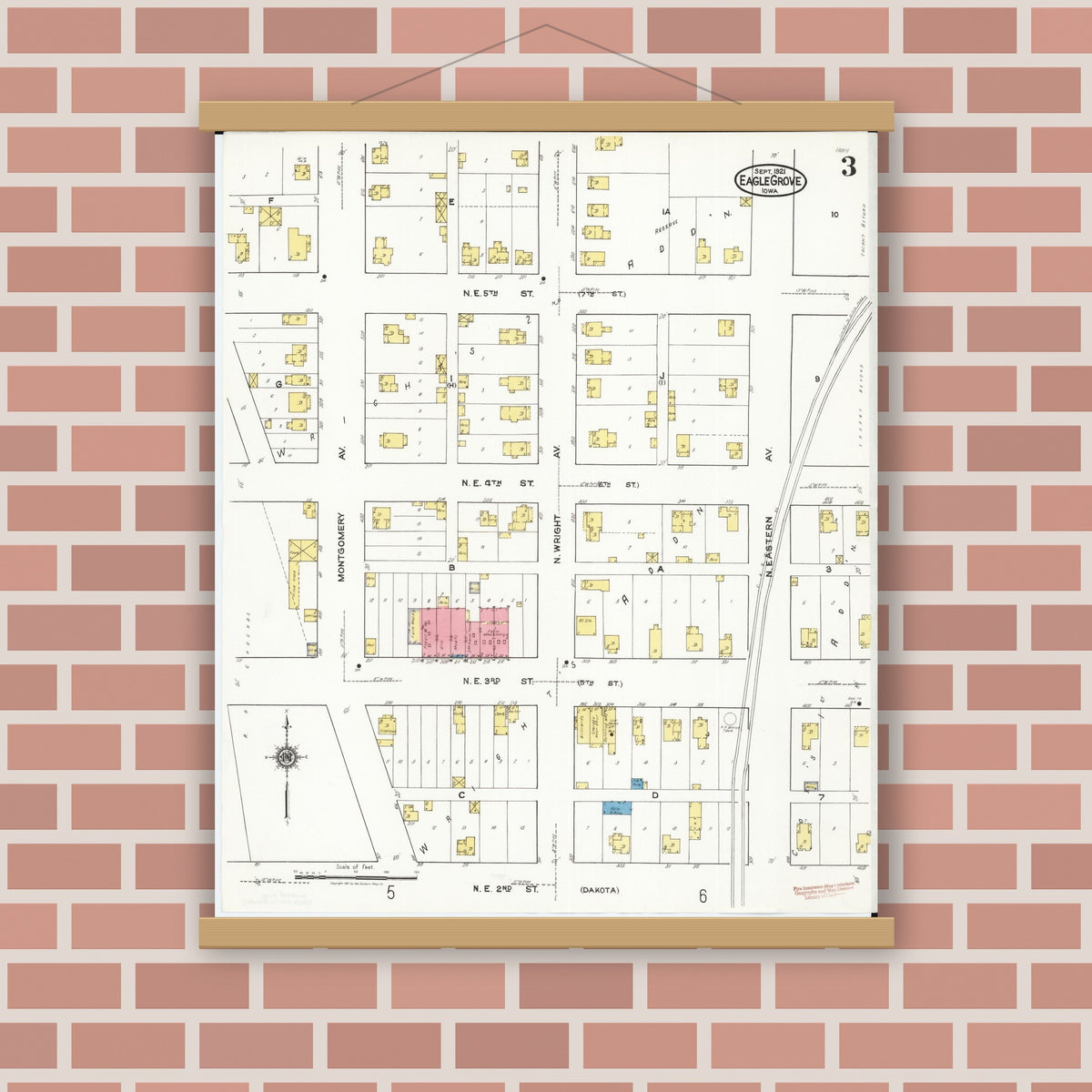 Old map wall art mockup — magnetic wood frame on brick wall — Sanborn Fire Insurance Map from Eagle Grove, Wright County, Iowa (1921), Sheet #0003