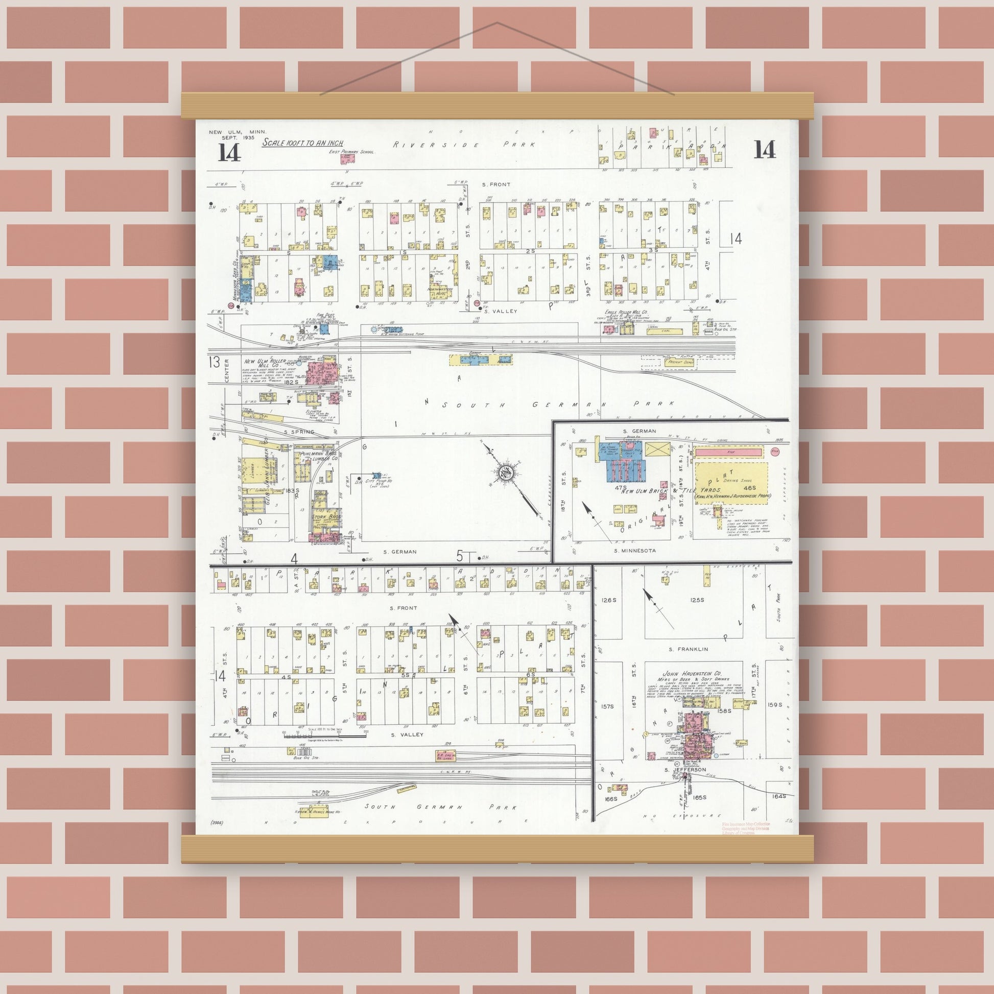 Old map wall art mockup — magnetic wood frame on brick wall — Sanborn Fire Insurance Map from New Ulm, Brown County, Minnesota (1935), Sheet #0014