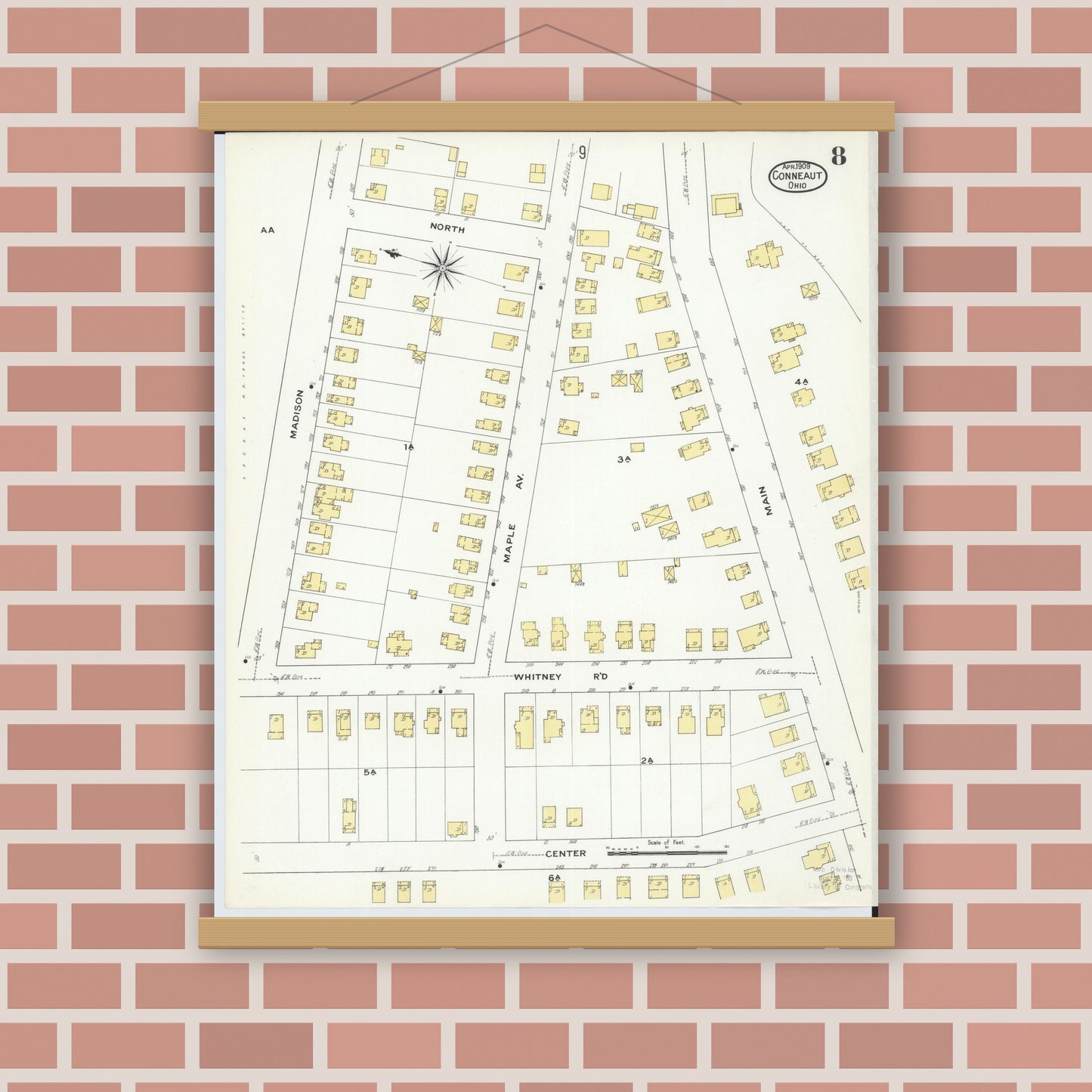 Old map wall art mockup — magnetic wood frame on brick wall — Sanborn Fire Insurance Map from Conneaut, Ashtabula County, Ohio (1909), Sheet #0008