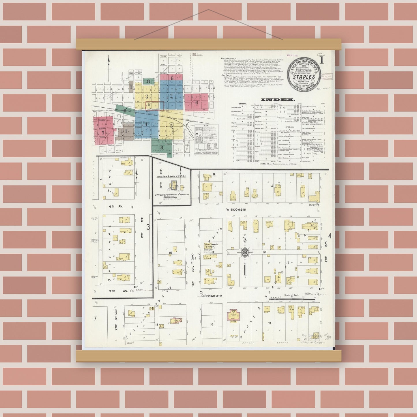 Old map wall art mockup — magnetic wood frame on brick wall — Sanborn Fire Insurance Map from Staples, Todd County, Minnesota (1909) - Complete Map Set