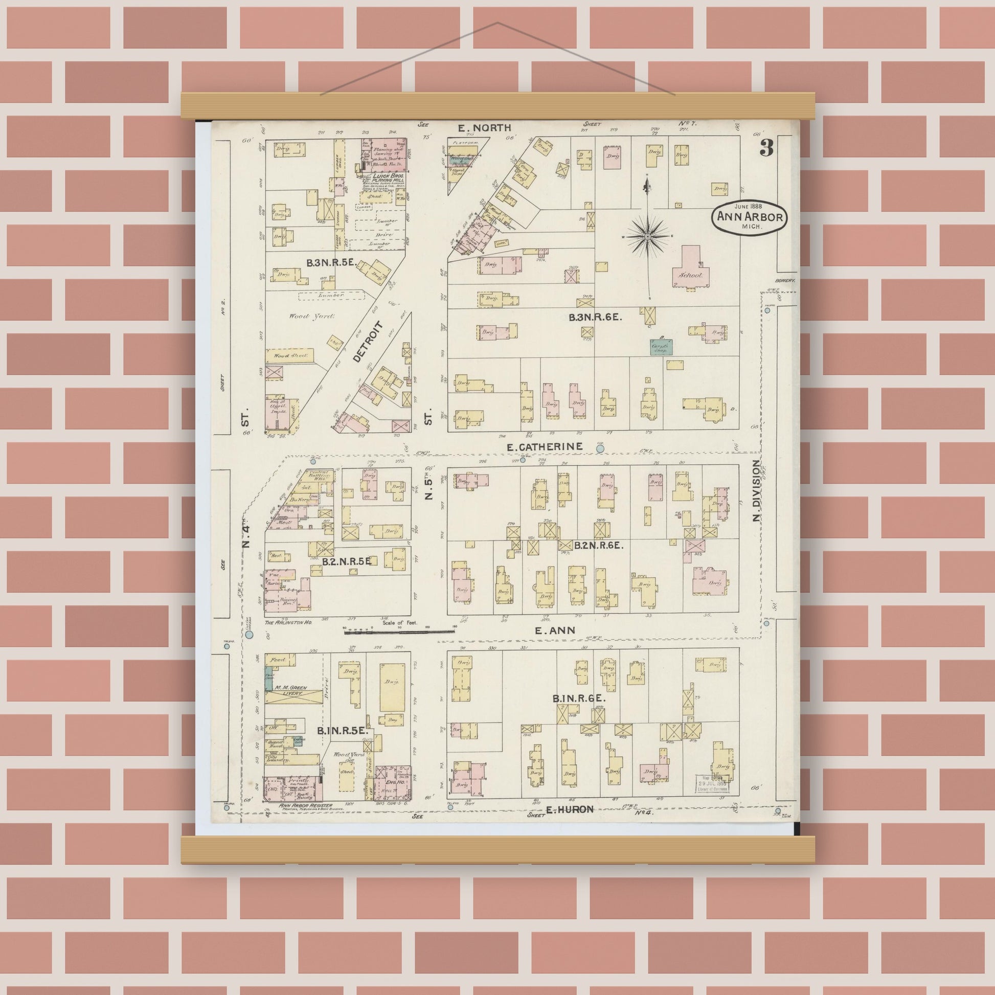 Old map wall art mockup — magnetic wood frame on brick wall — Sanborn Fire Insurance Map from Ann Arbor, Washtenaw County, Michigan (1888), Sheet #0003