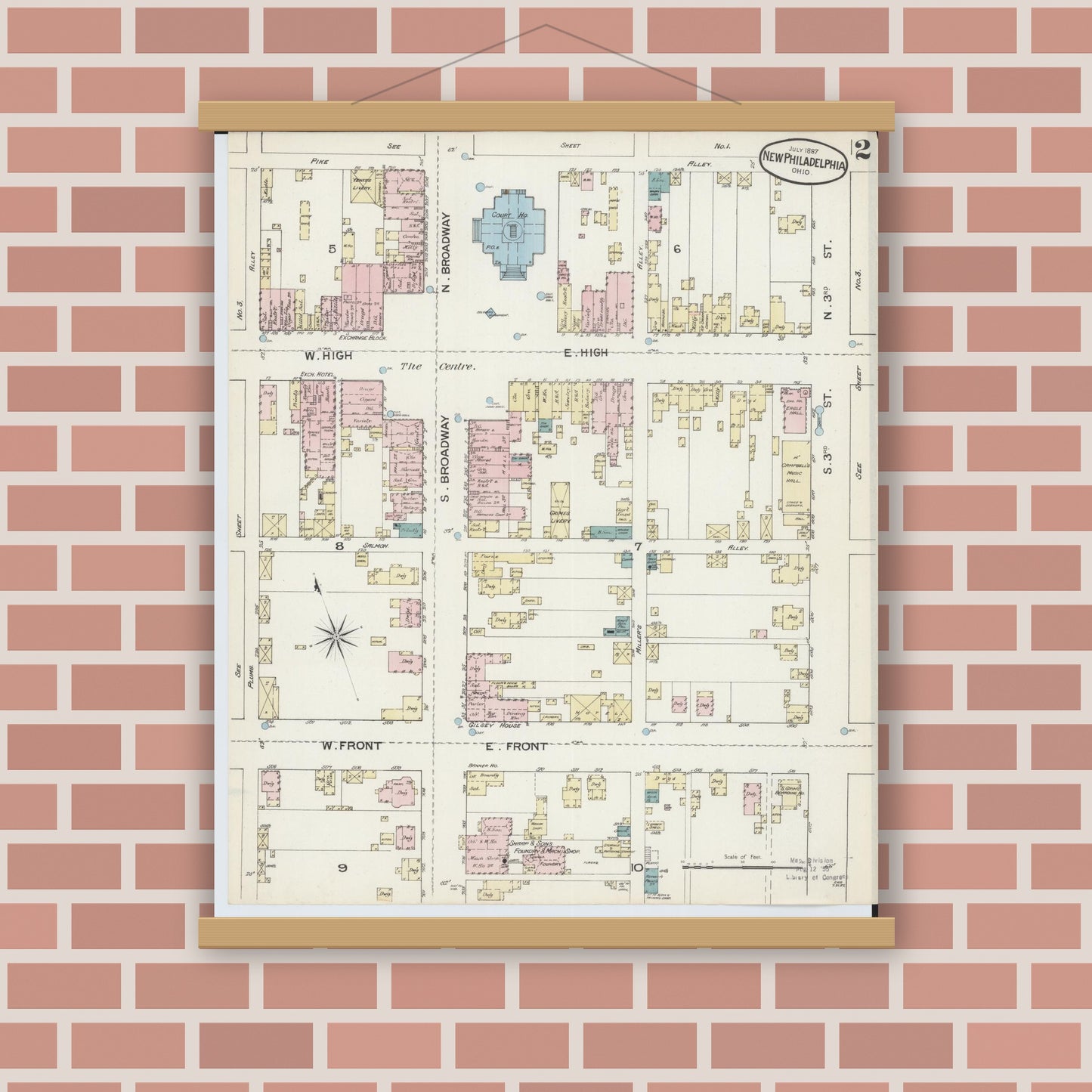 Old map wall art mockup — magnetic wood frame on brick wall — Sanborn Fire Insurance Map from New Philadelphia, Tuscarawas County, Ohio (1887), Sheet #0002