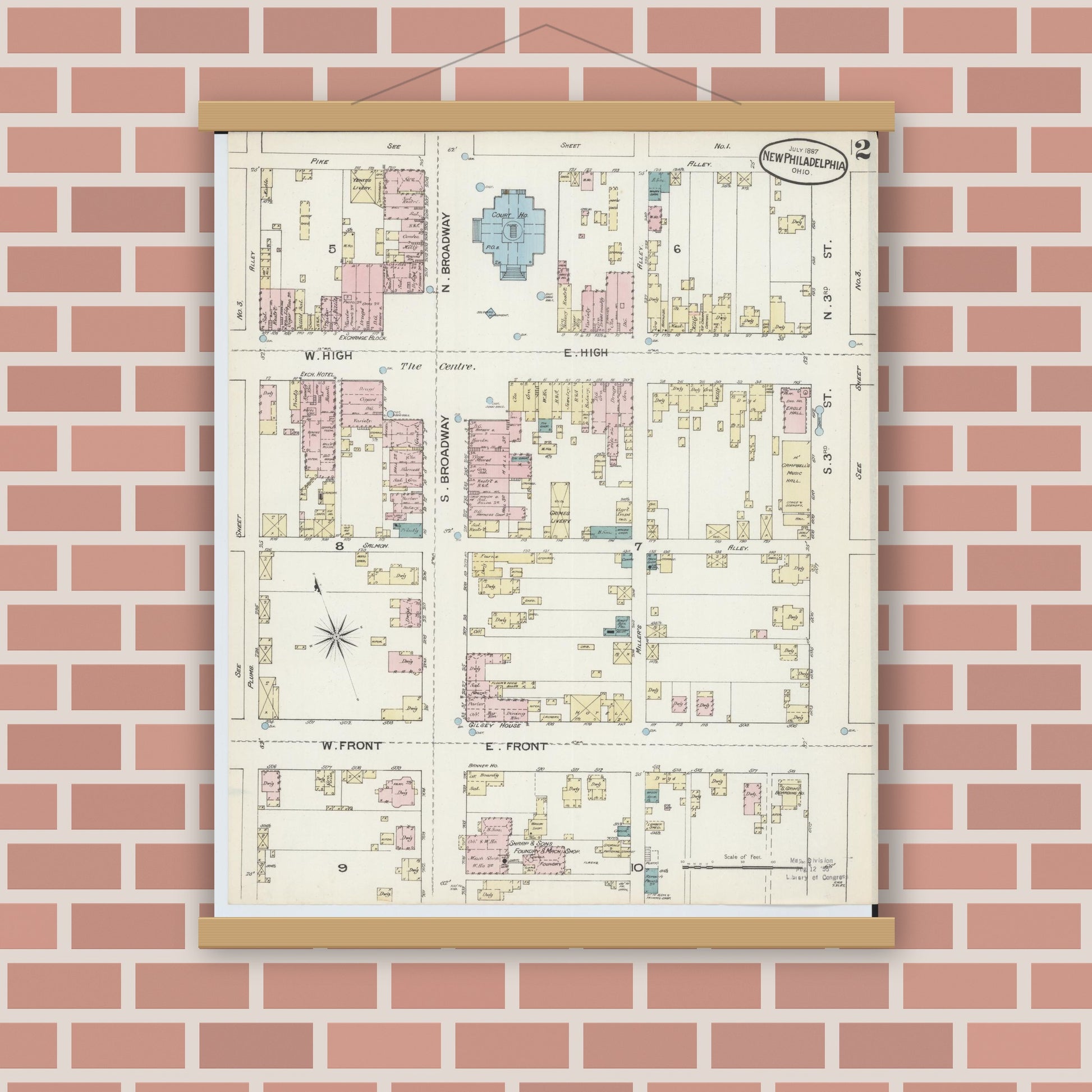 Old map wall art mockup — magnetic wood frame on brick wall — Sanborn Fire Insurance Map from New Philadelphia, Tuscarawas County, Ohio (1887), Sheet #0002