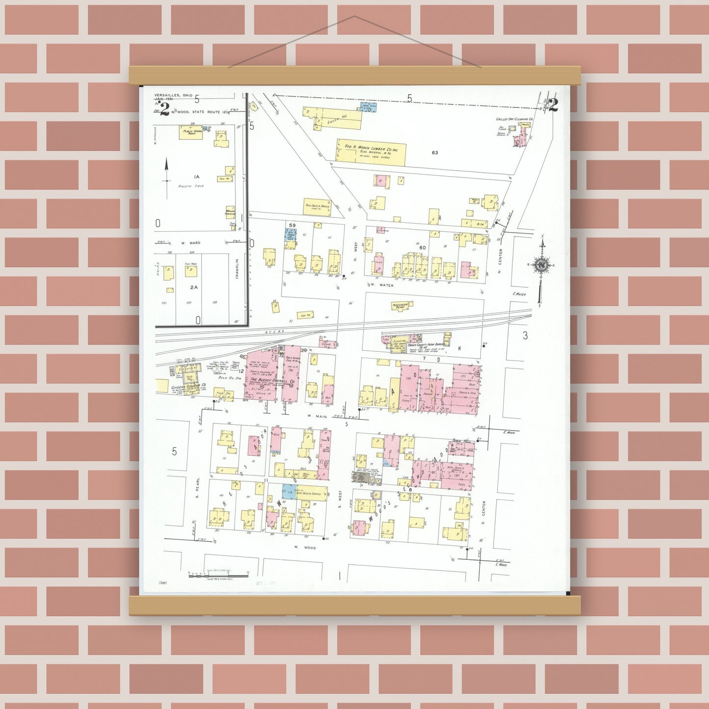 Old map wall art mockup — magnetic wood frame on brick wall — Sanborn Fire Insurance Map from Versailles, Darke County, Ohio (1951), Sheet #0002