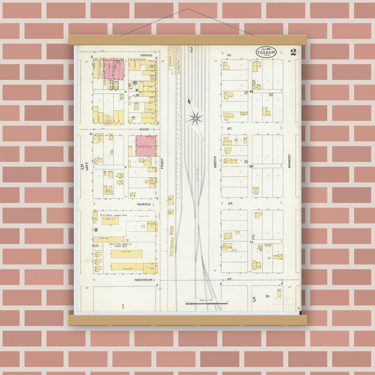 Old map wall art mockup — magnetic wood frame on brick wall — Sanborn Fire Insurance Map from Yoakum, De Witt And Lavaca Counties, Texas (1904), Sheet #0002