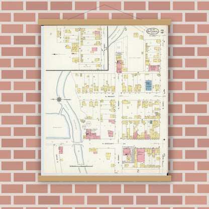 Old map wall art mockup — magnetic wood frame on brick wall — Sanborn Fire Insurance Map from Bucyrus, Crawford County, Ohio (1910), Sheet #0002