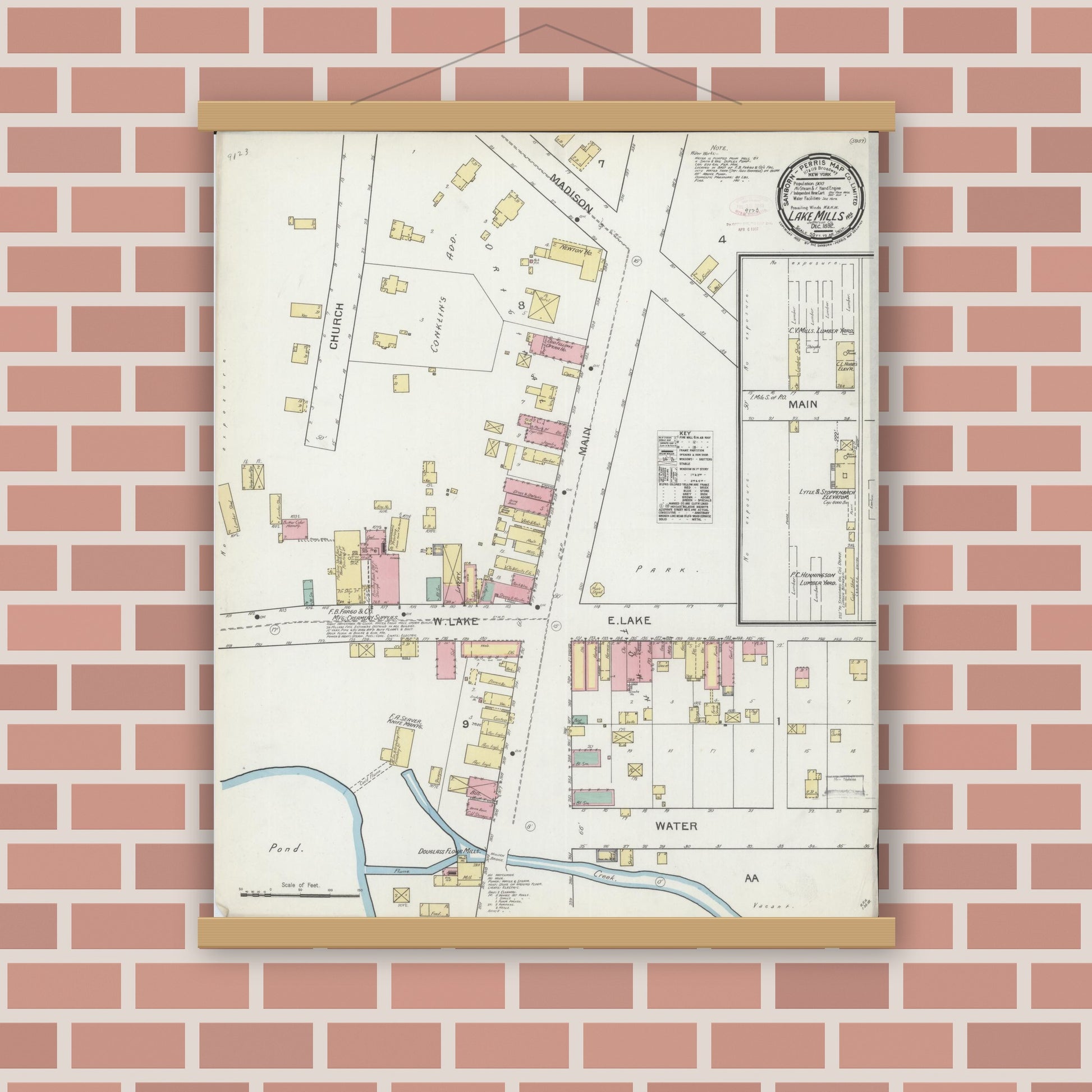 Old map wall art mockup — magnetic wood frame on brick wall — Sanborn Fire Insurance Map from Lake Mills, Jefferson County, Wisconsin (1892), Sheet #0001