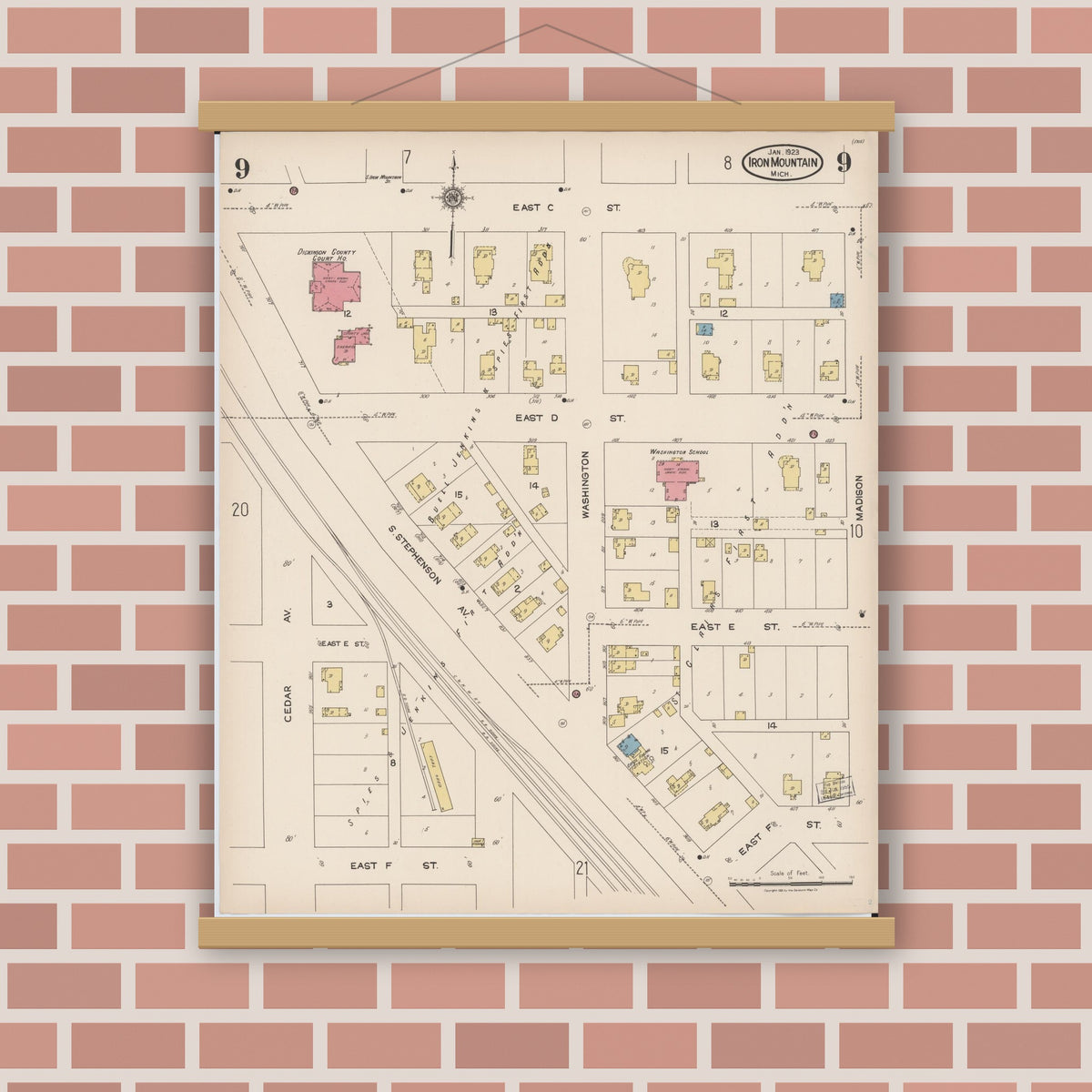 Old map wall art mockup — magnetic wood frame on brick wall — Sanborn Fire Insurance Map from Iron Mountain, Dickinson County, Michigan (1923), Sheet #0009