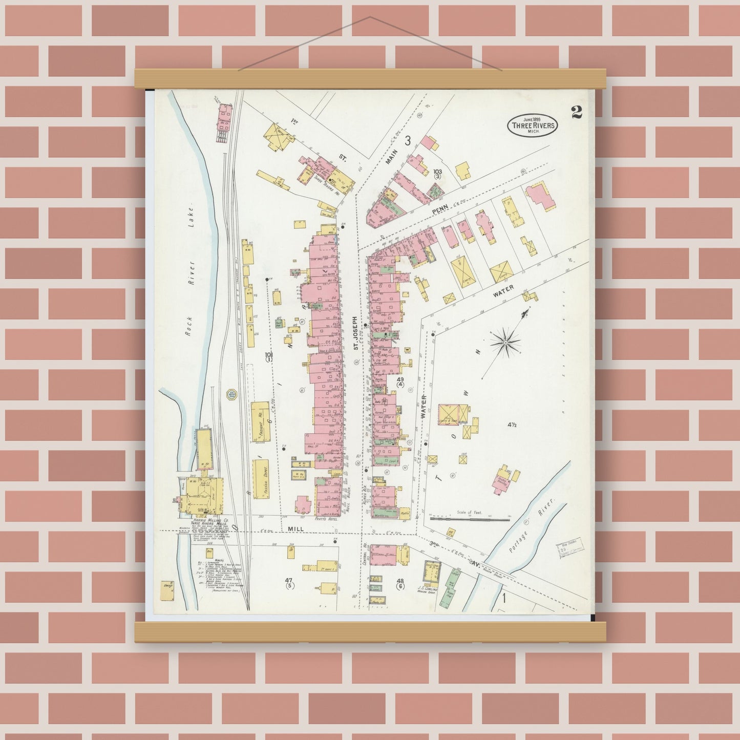 Old map wall art mockup — magnetic wood frame on brick wall — Sanborn Fire Insurance Map from Three Rivers, Saint Joseph County, Michigan (1899), Sheet #0002