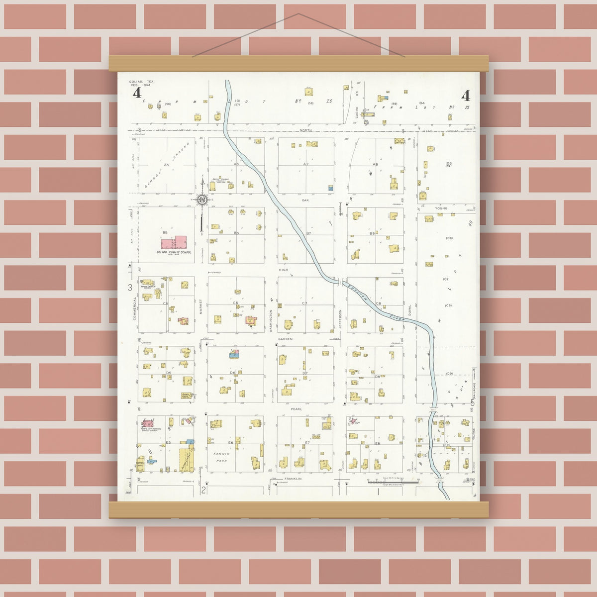 Old map wall art mockup — magnetic wood frame on brick wall — Sanborn Fire Insurance Map from Goliad, Goliad County, Texas (1934), Sheet #0004