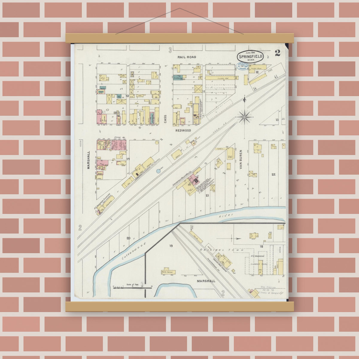 Old map wall art mockup — magnetic wood frame on brick wall — Sanborn Fire Insurance Map from Springfield, Brown County, Minnesota (1894), Sheet #0002