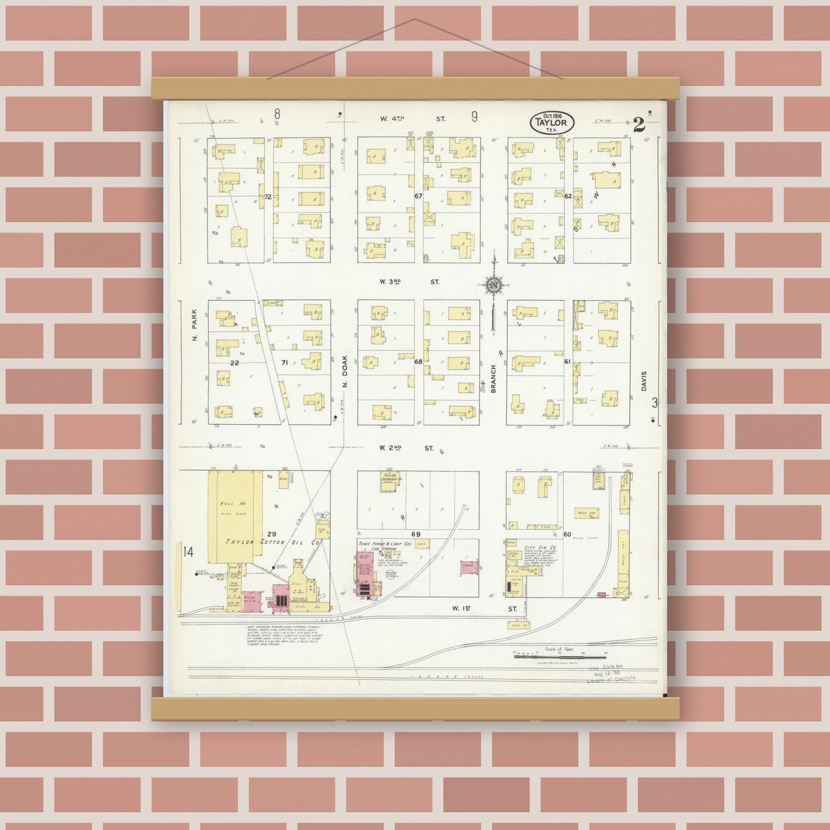 Old map wall art mockup — magnetic wood frame on brick wall — Sanborn Fire Insurance Map from Taylor, Williamson County, Texas (1916), Sheet #0002