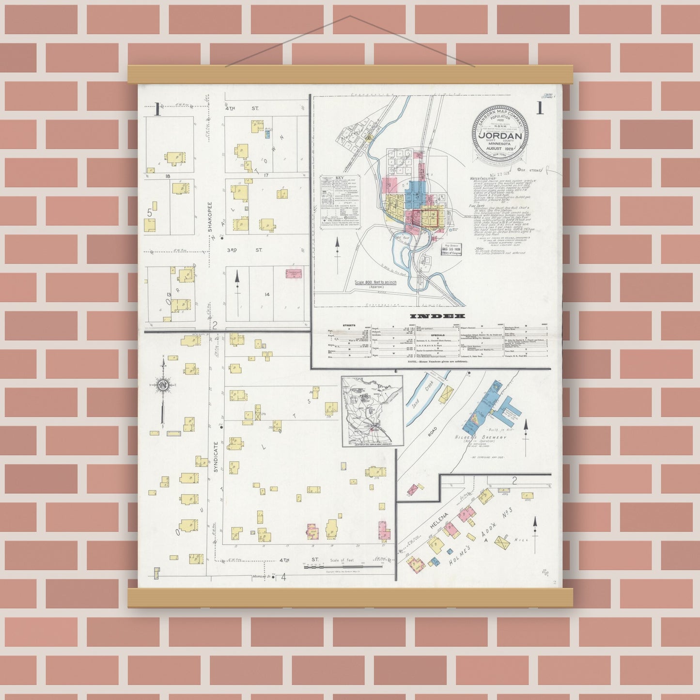 Old map wall art mockup — magnetic wood frame on brick wall — Sanborn Fire Insurance Map from Jordan, Scott County, Minnesota (1928), Sheet #0001