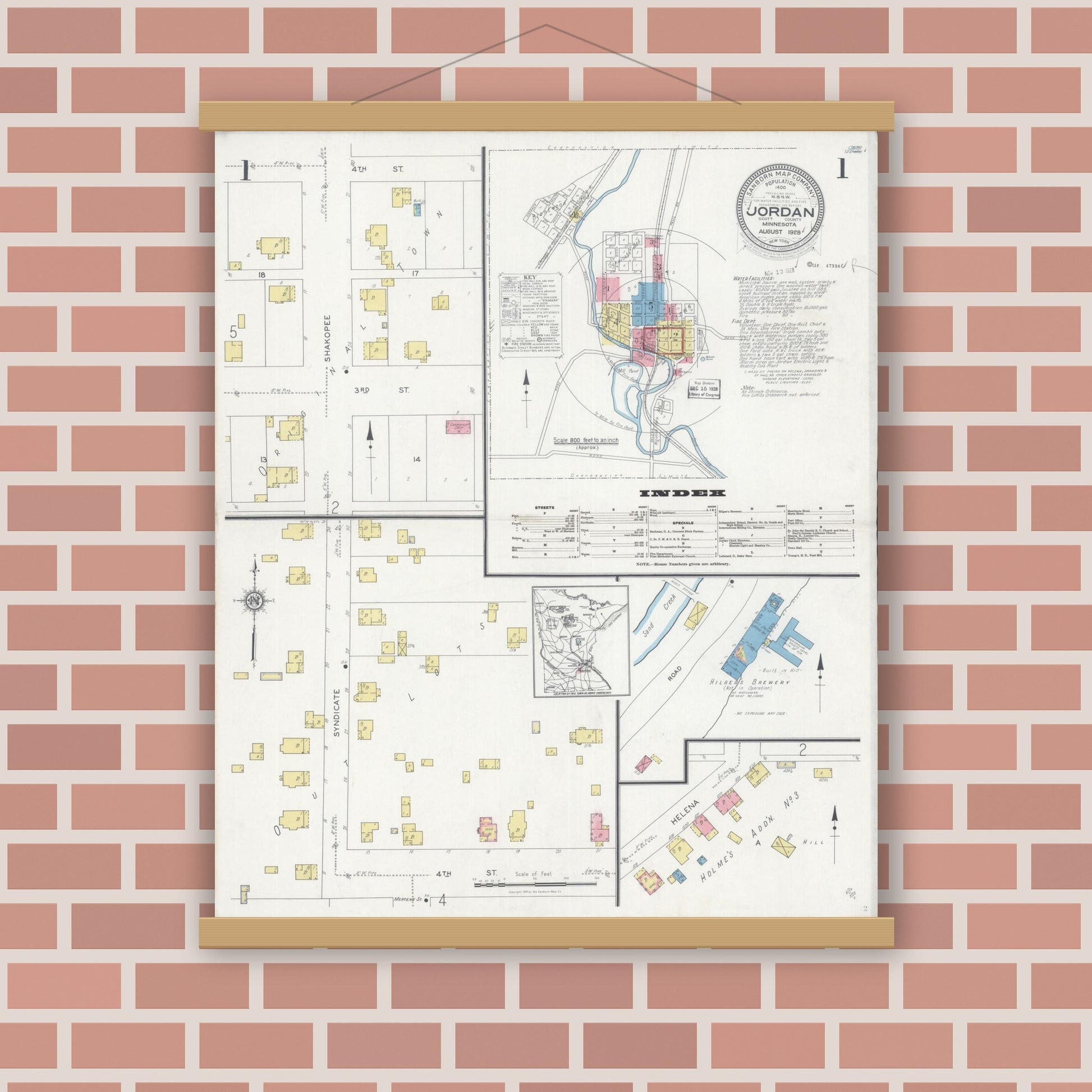 Old map wall art mockup — magnetic wood frame on brick wall — Sanborn Fire Insurance Map from Jordan, Scott County, Minnesota (1928), Sheet #0001