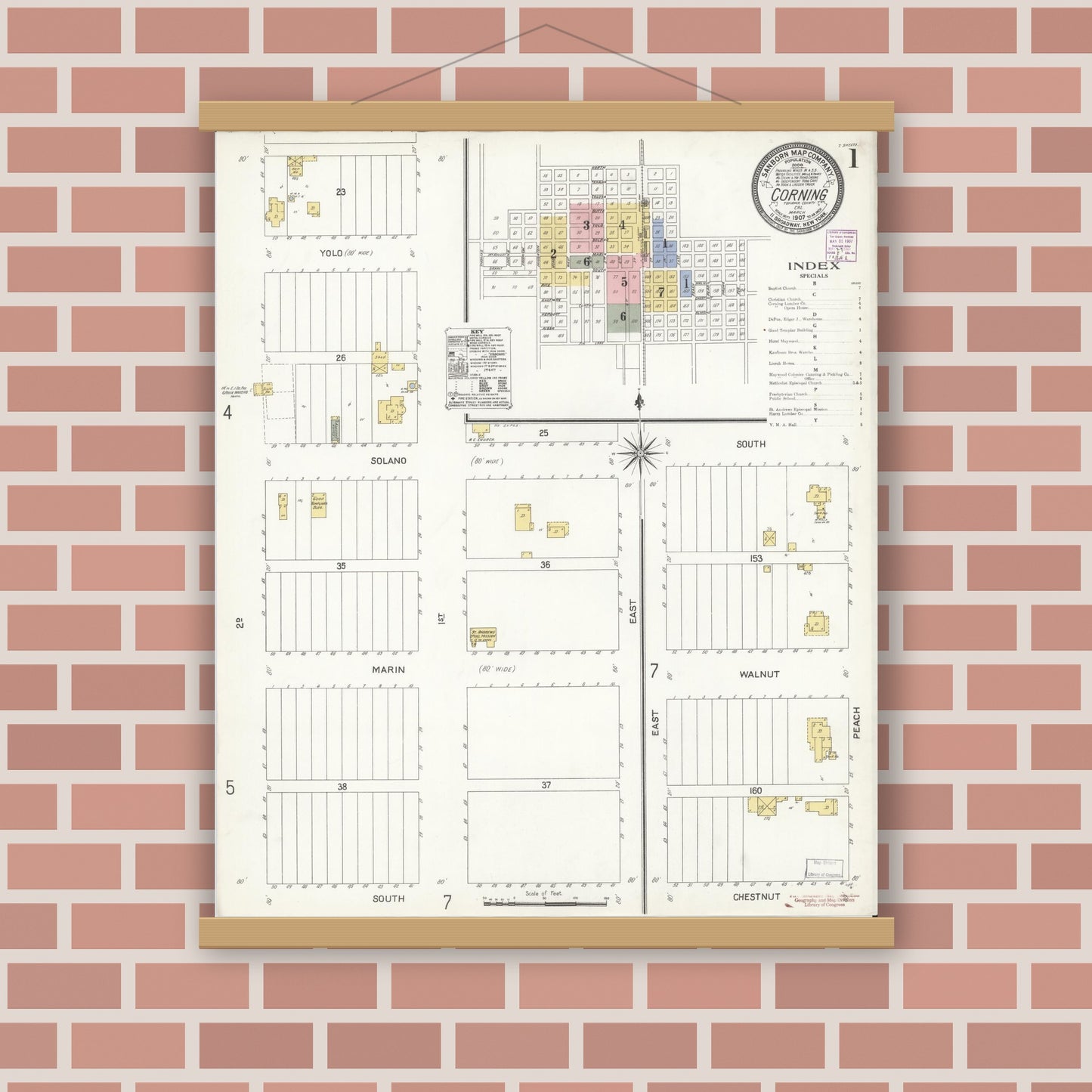 Old map wall art mockup — magnetic wood frame on brick wall — Sanborn Fire Insurance Map from Corning, Tehama County, California (1907), Sheet #0001