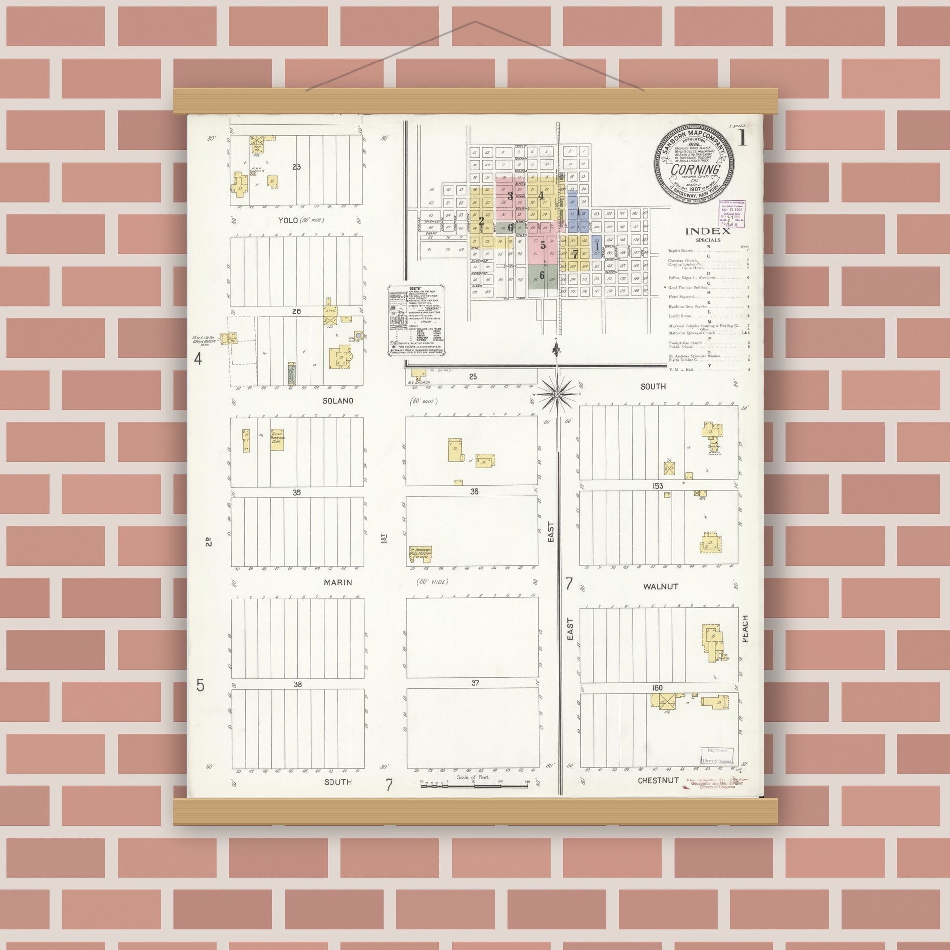 Old map wall art mockup — magnetic wood frame on brick wall — Sanborn Fire Insurance Map from Corning, Tehama County, California (1907), Sheet #0001