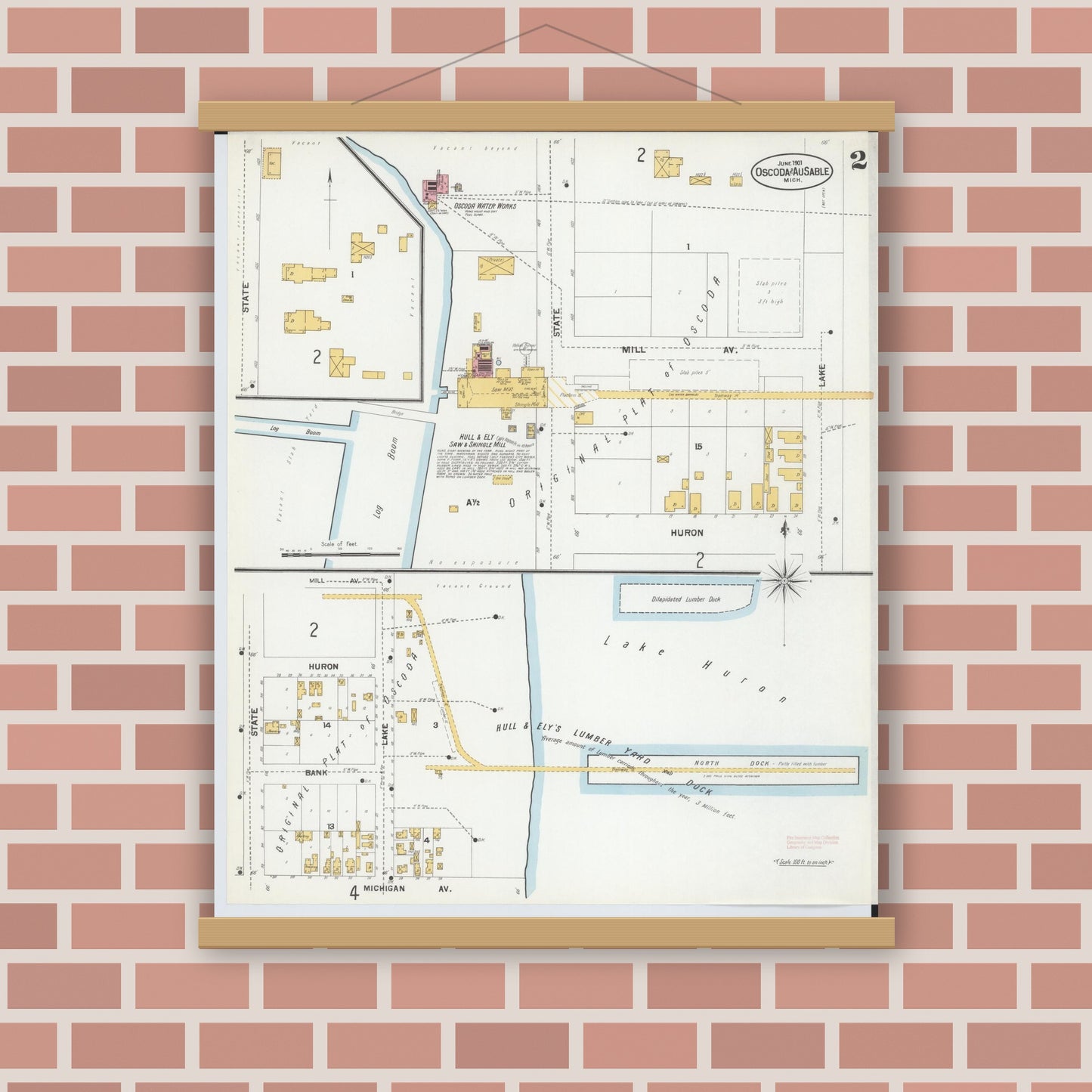 Old map wall art mockup — magnetic wood frame on brick wall — Sanborn Fire Insurance Map from Oscoda, Iosco County, Michigan (1901), Sheet #0002