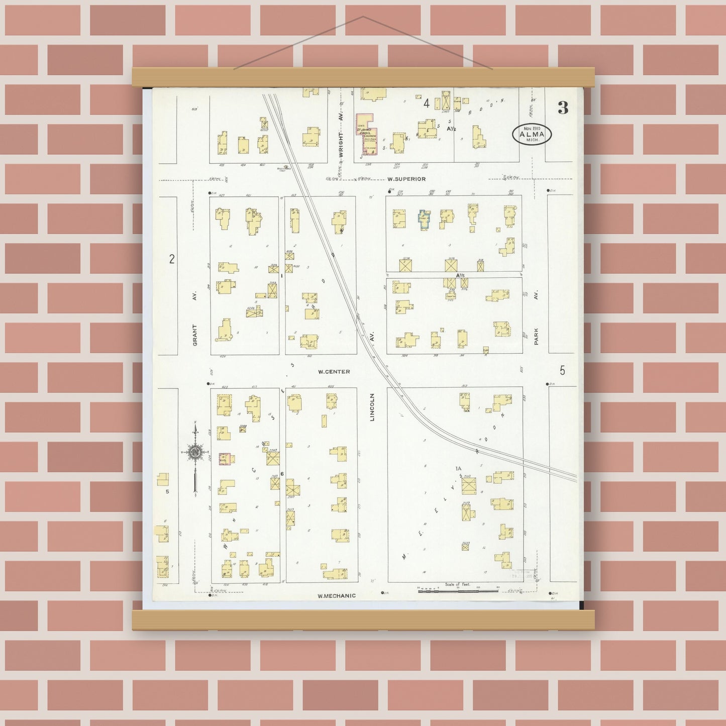 Old map wall art mockup — magnetic wood frame on brick wall — Sanborn Fire Insurance Map from Alma, Gratiot County, Michigan (1910), Sheet #0003