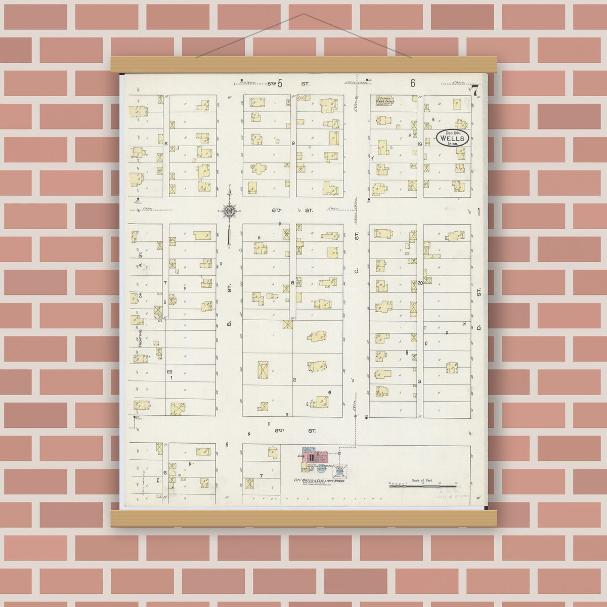 Old map wall art mockup — magnetic wood frame on brick wall — Sanborn Fire Insurance Map from Wells, Faribault County, Minnesota (1914), Sheet #0007